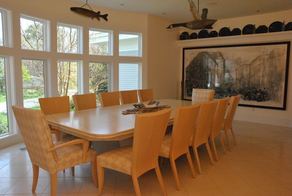 128 Point Road Marion, MA 02738 - Photo 8 of 25 a view of a dining room with furniture window and outside view