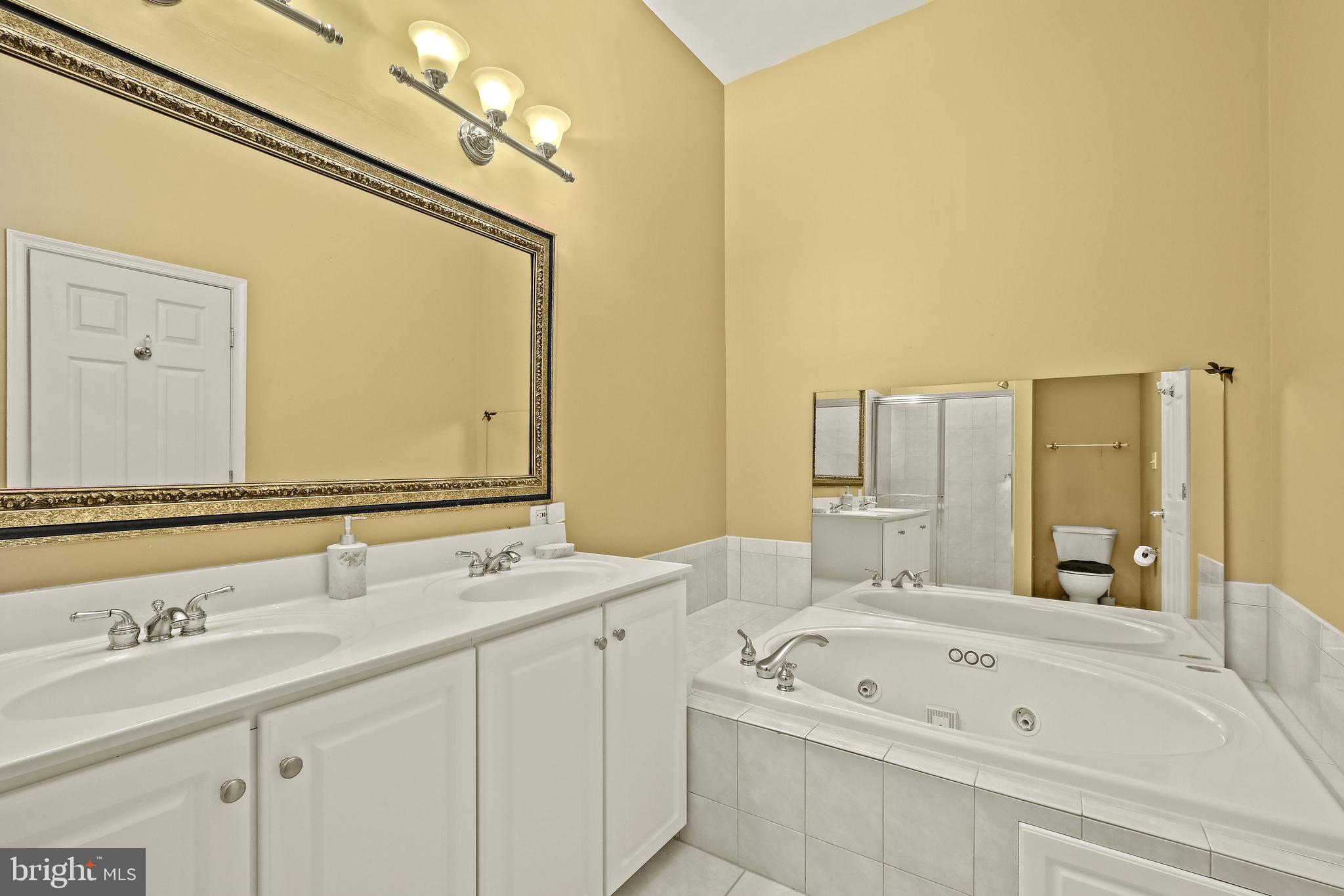 8826 Lew Wallace Road Frederick, MD 21704 - Photo 24 of 33 Primary bath w/ jetted tub & double vanity