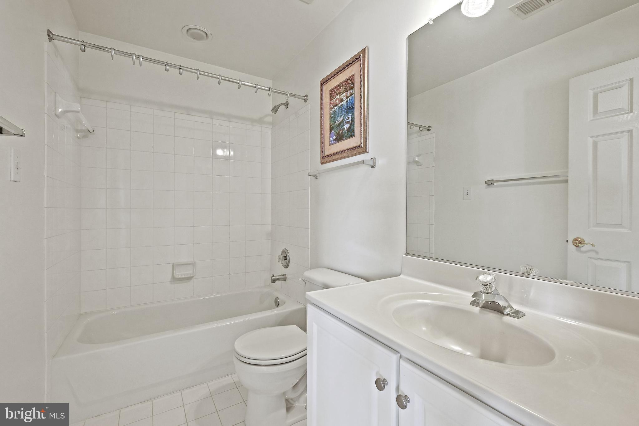 8826 Lew Wallace Road Frederick, MD 21704 - Photo 28 of 33 Upper level 2nd full bath with ceramic tile