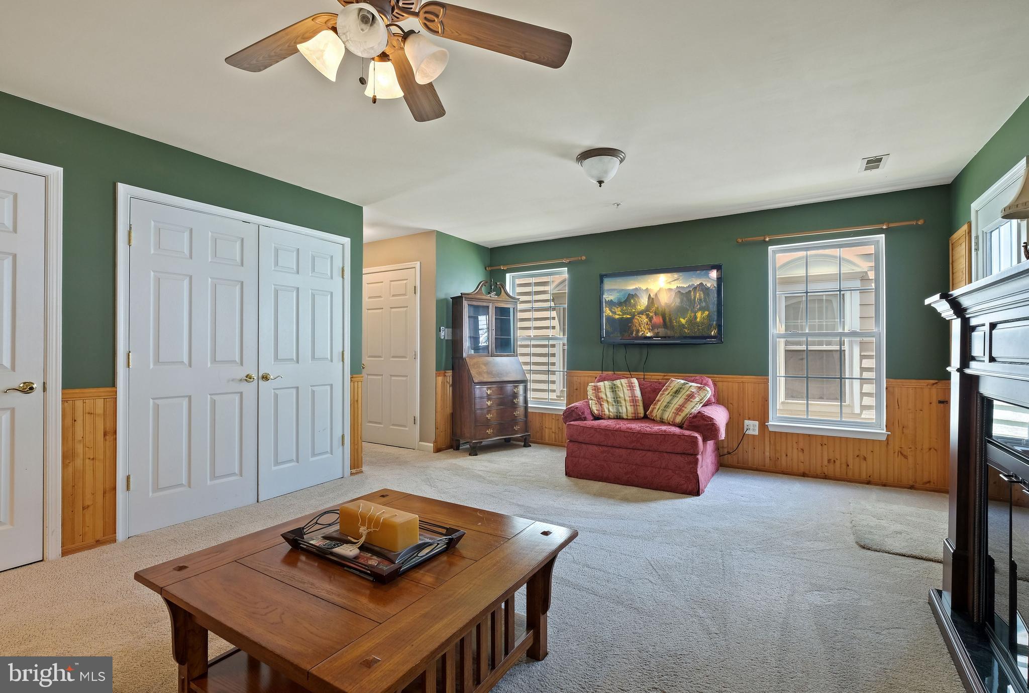 8826 Lew Wallace Road Frederick, MD 21704 - Photo 6 of 33 Recreation room w/ceiling fan & storage access