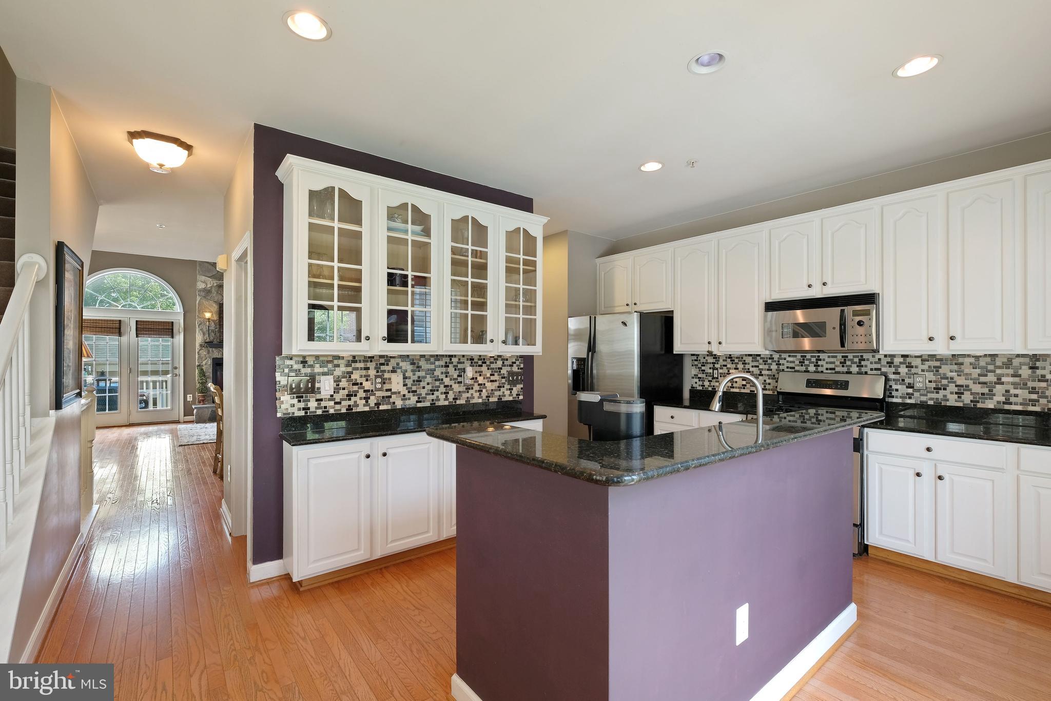 8826 Lew Wallace Road Frederick, MD 21704 - Photo 9 of 33 Kitchen w/hardwood floor & recessed lights