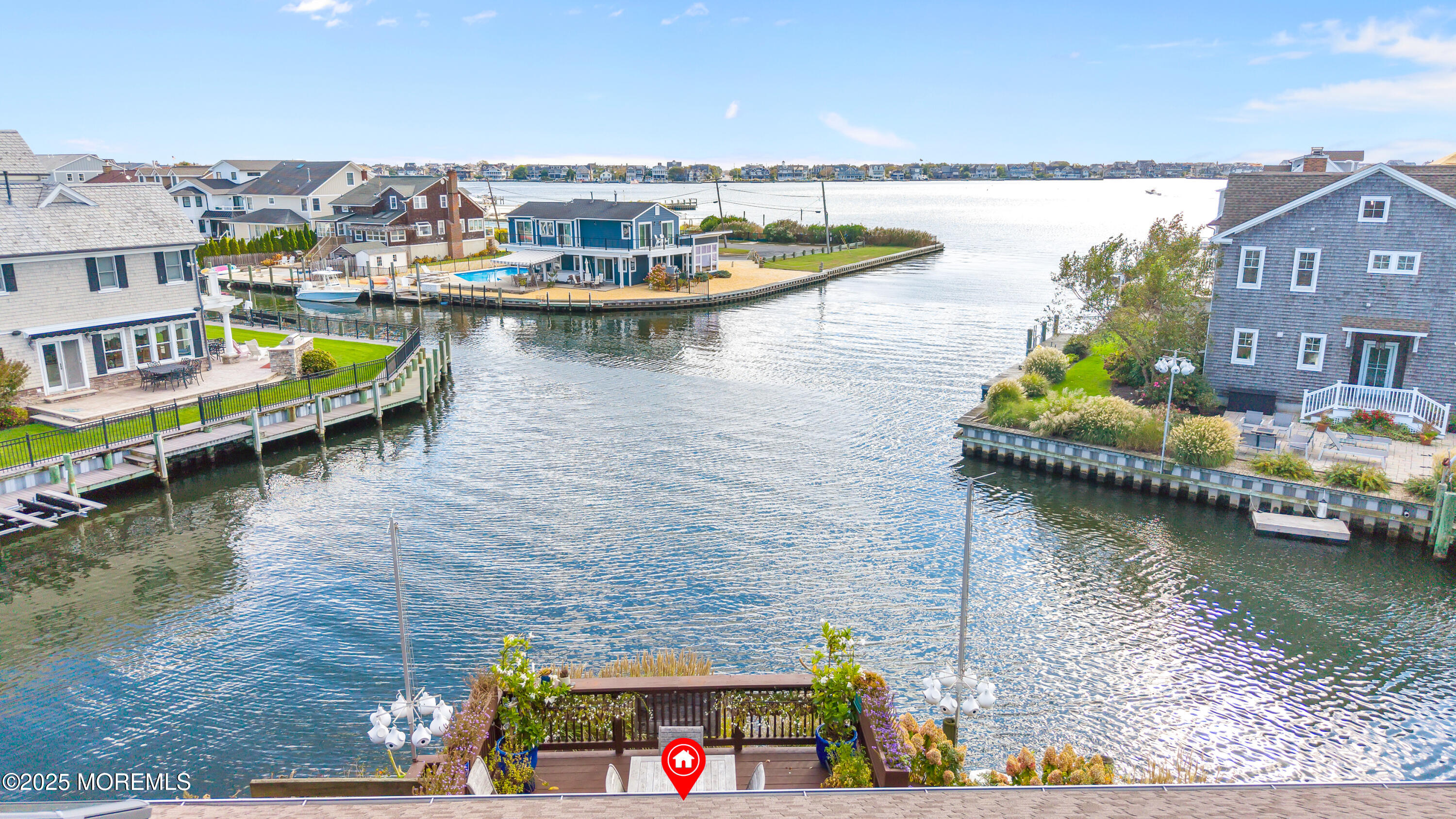 1700 Rue Mirador Point Pleasant, NJ 08742 - Photo 13 of 64 a view of a lake with a nearby beach