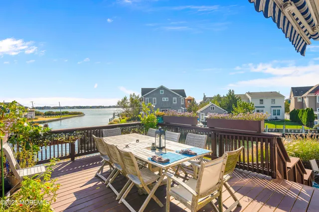a view of a pathway with a wrought fence