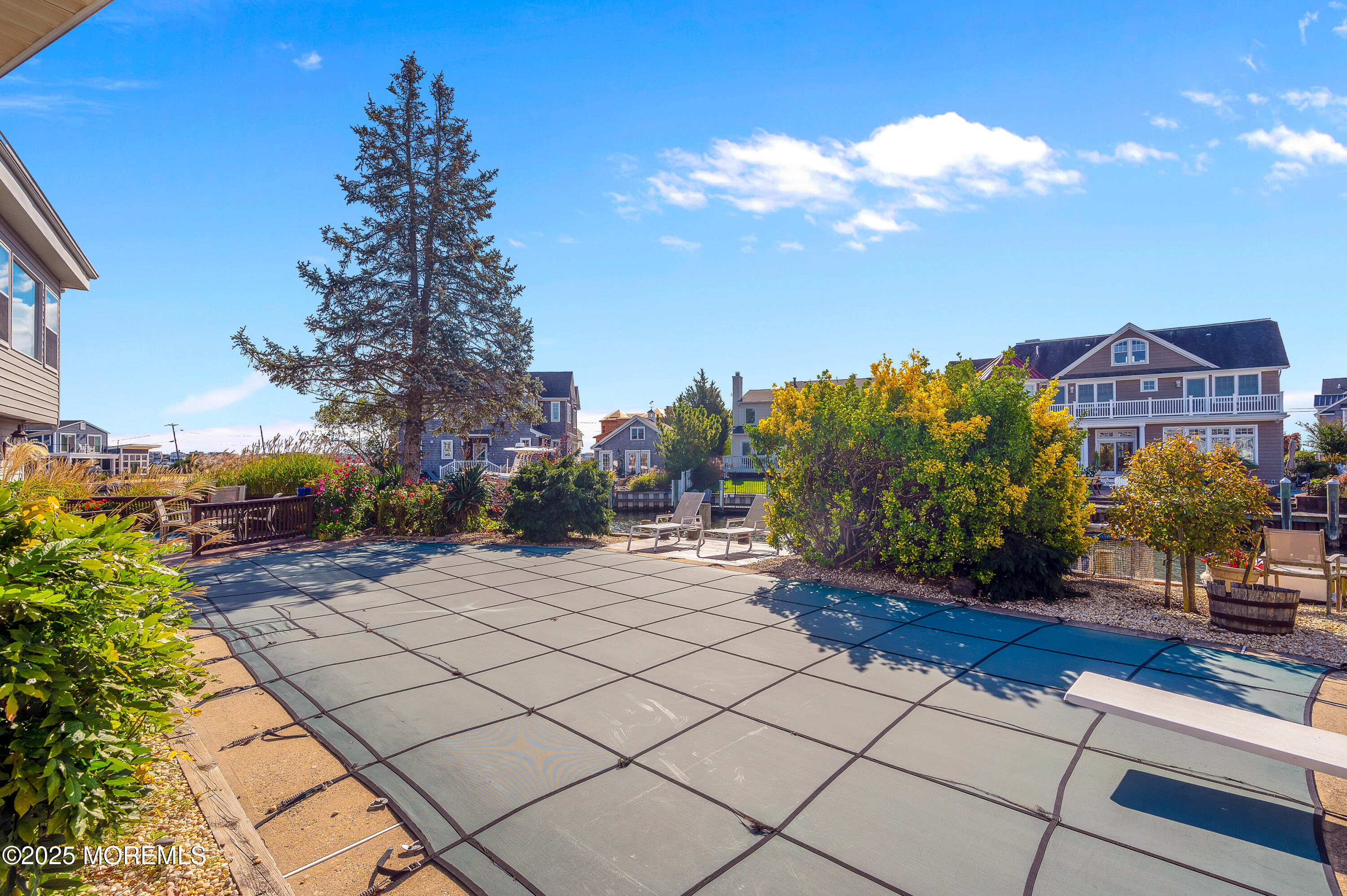 1700 Rue Mirador Point Pleasant, NJ 08742 - Photo 26 of 64 a view of a pathway with a wrought fence