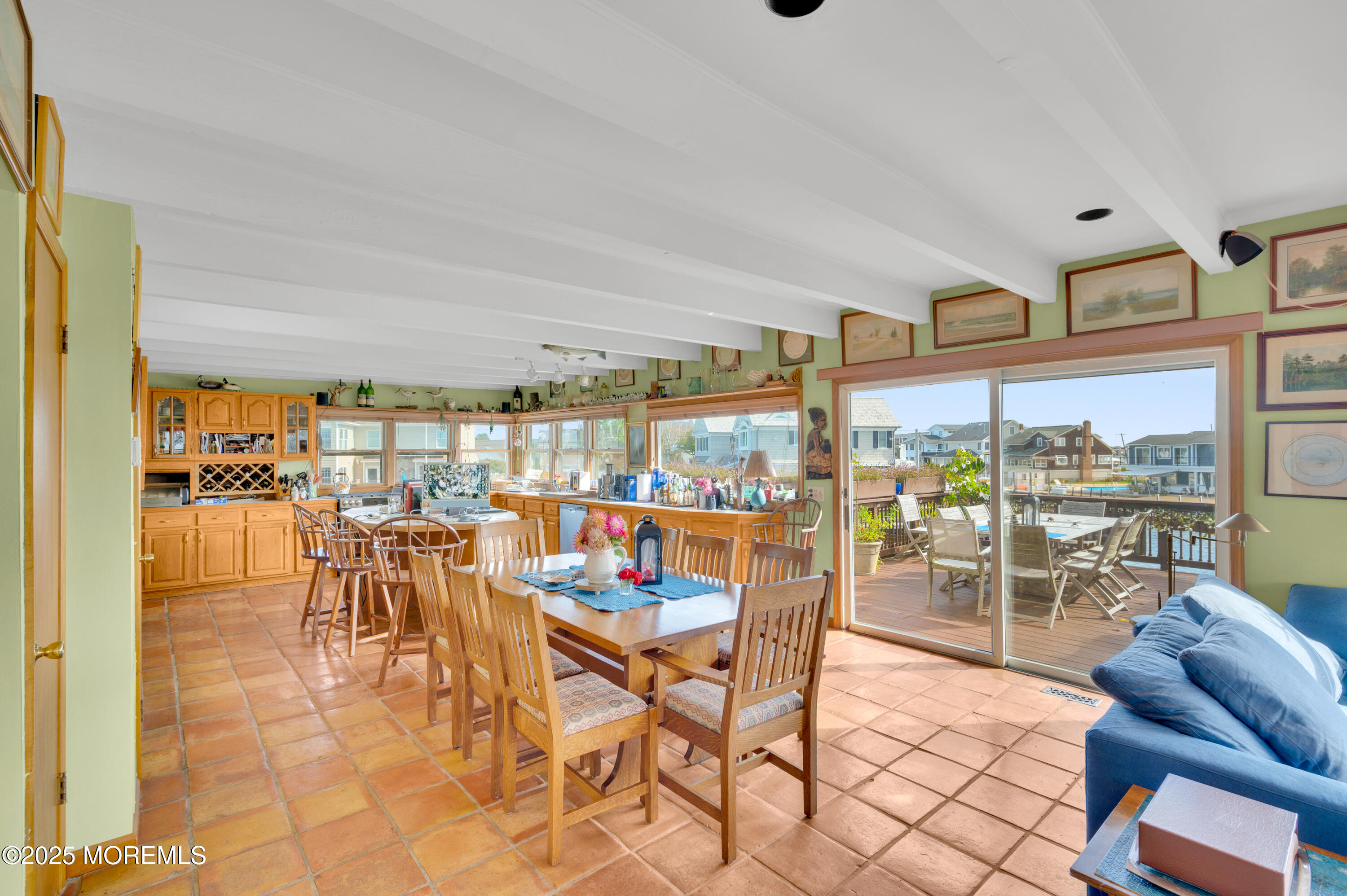 1700 Rue Mirador Point Pleasant, NJ 08742 - Photo 36 of 64 a dining room with furniture and a floor to ceiling window