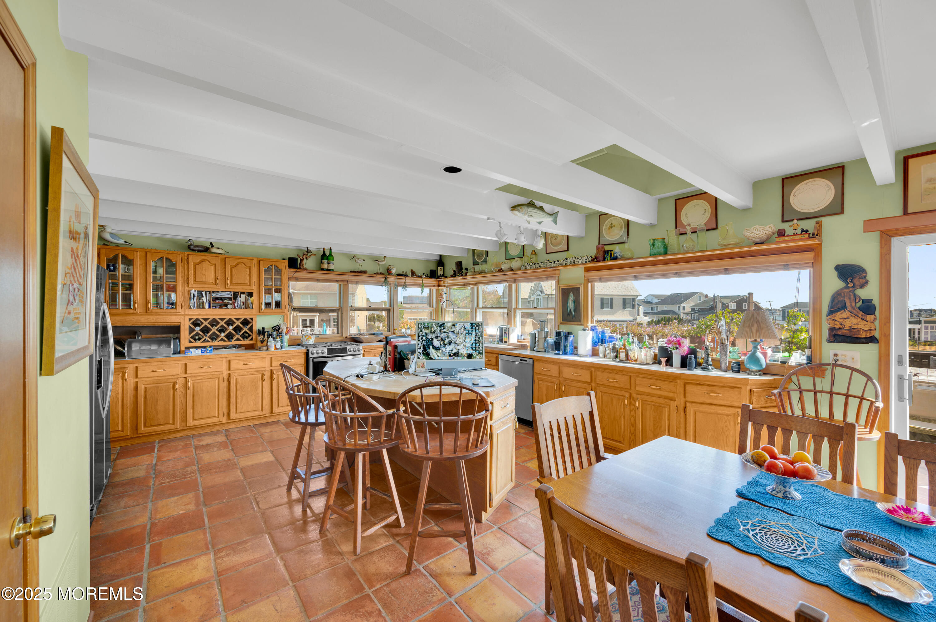 1700 Rue Mirador Point Pleasant, NJ 08742 - Photo 40 of 64 a view of a dining room with furniture and kitchen view
