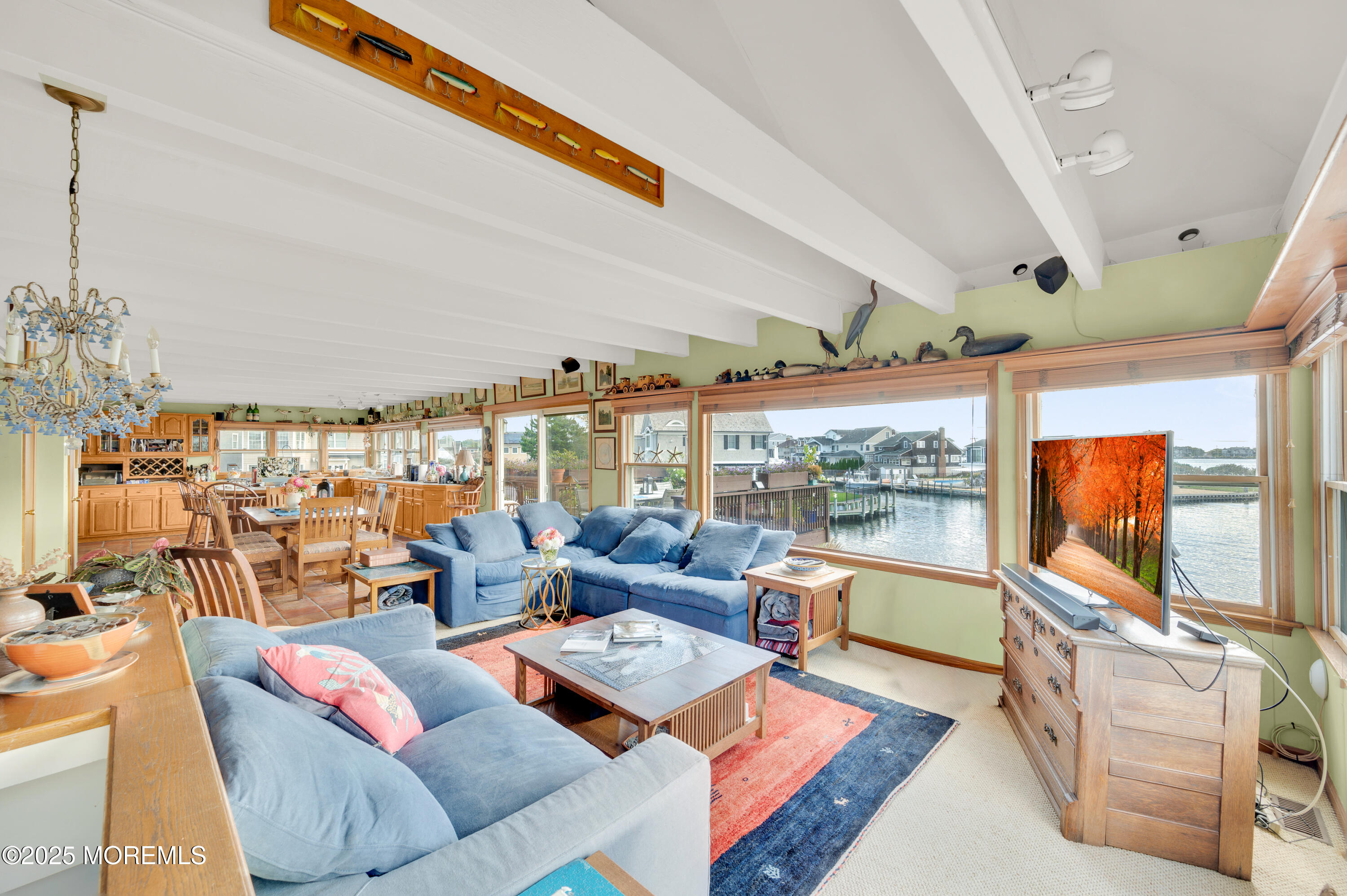 1700 Rue Mirador Point Pleasant, NJ 08742 - Photo 44 of 64 a living room with furniture and a flat screen tv