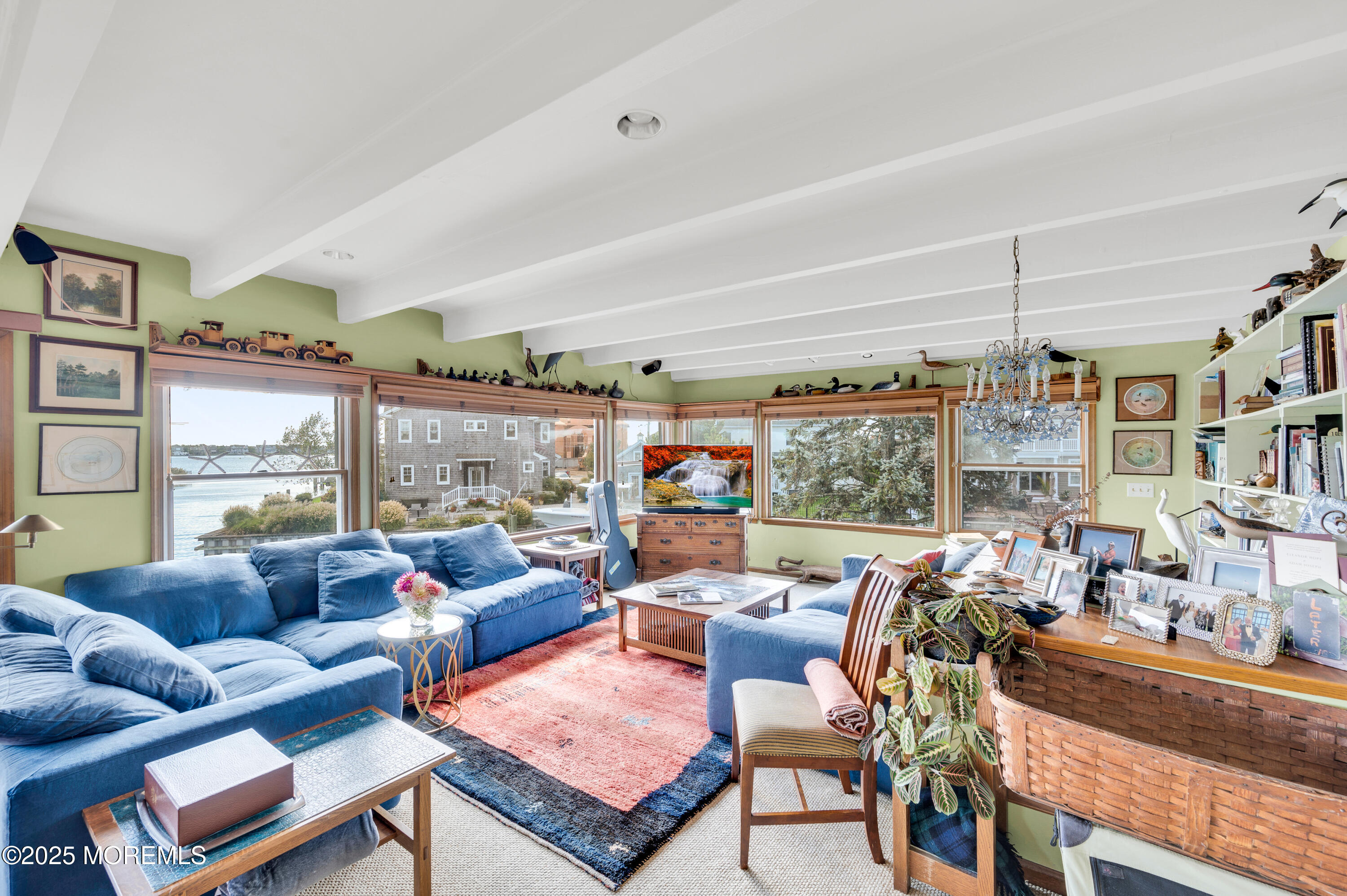 1700 Rue Mirador Point Pleasant, NJ 08742 - Photo 46 of 64 a living room with lots of furniture and a large window