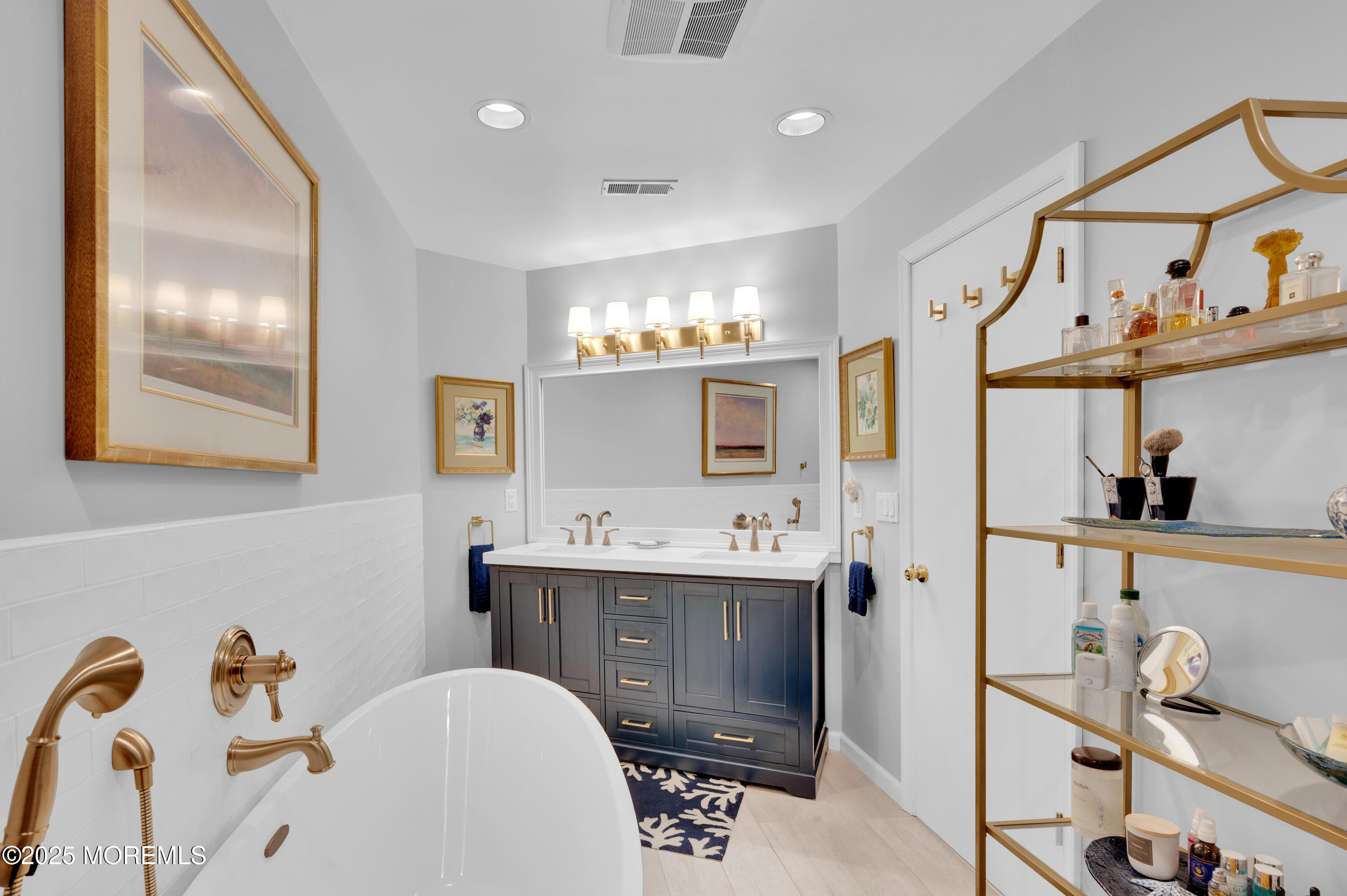 1700 Rue Mirador Point Pleasant, NJ 08742 - Photo 54 of 64 a bathroom with a tub sink and mirror