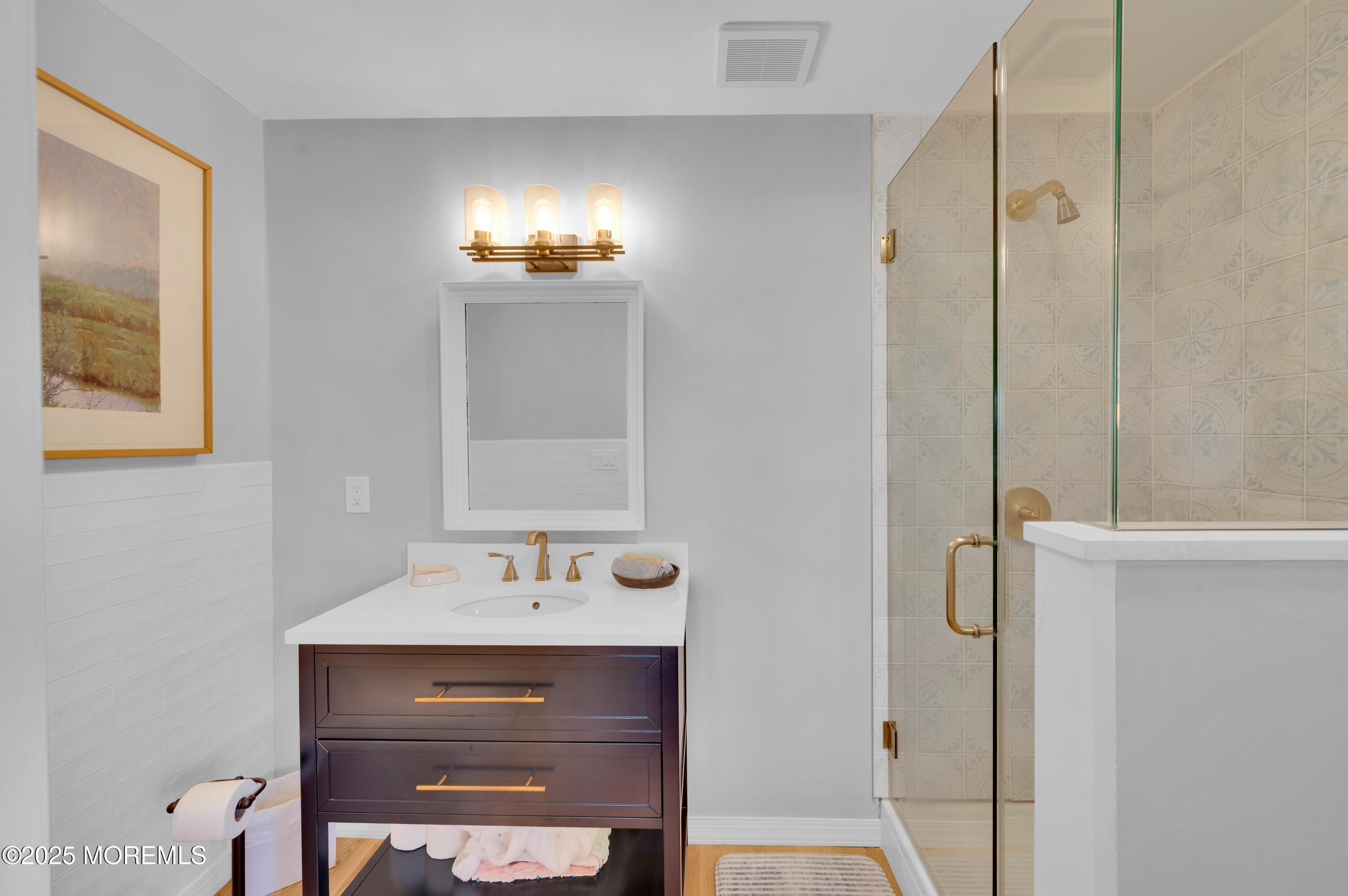 1700 Rue Mirador Point Pleasant, NJ 08742 - Photo 57 of 64 a bathroom with a sink and a mirror
