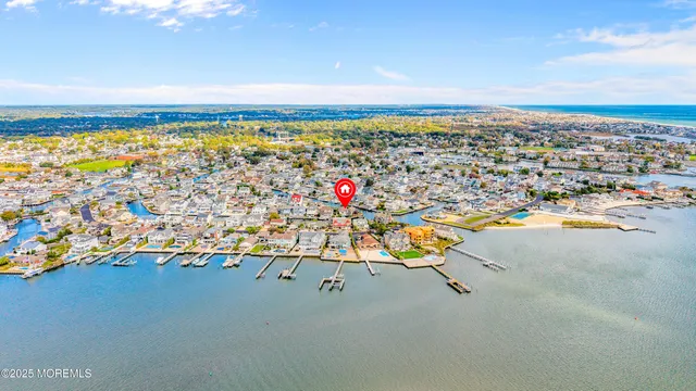 a terrace with outdoor seating and city view