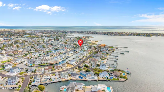 a view of a patio with a table and chairs