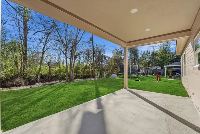 a view of a backyard with garden