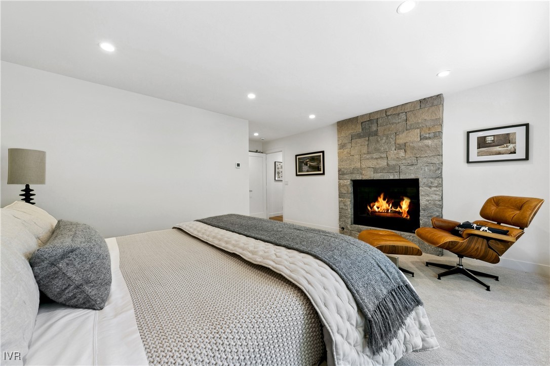 150 Juanita Drive, Unit 2 Incline Village, NV 89451 - Photo 20 of 41 a bedroom with a bed and a fireplace