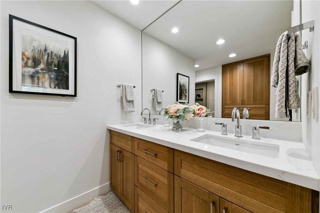 150 Juanita Drive, Unit 2 Incline Village, NV 89451 - Photo 21 of 41 a bathroom with a double vanity sink and a mirror