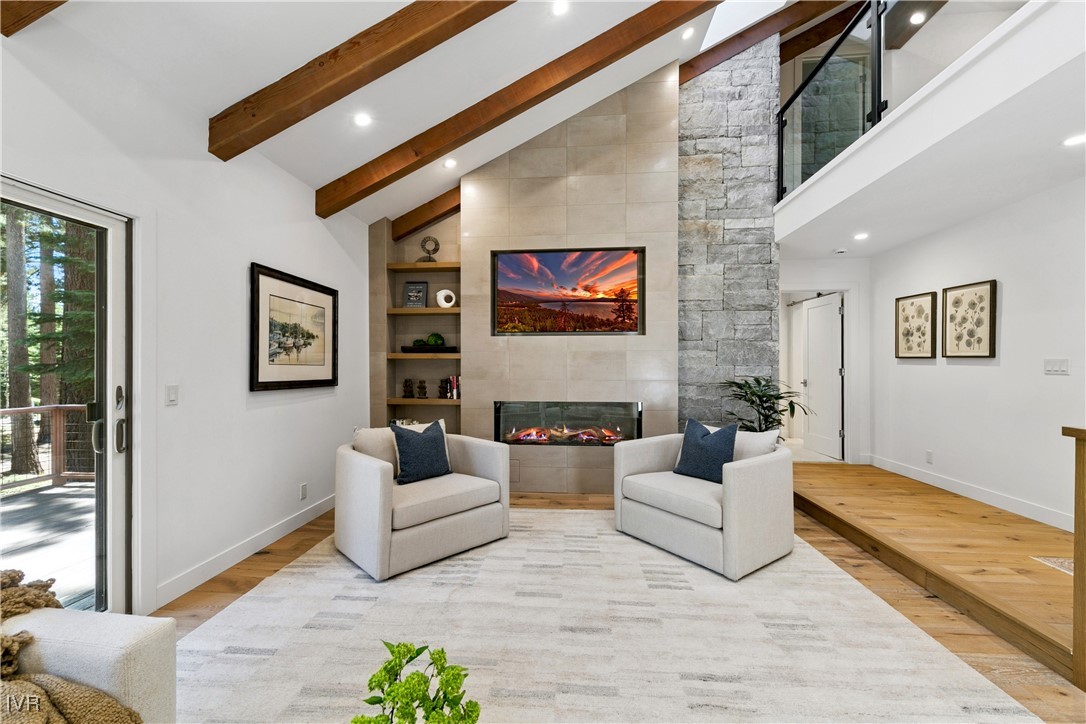 150 Juanita Drive, Unit 2 Incline Village, NV 89451 - Photo 3 of 41 a living room with fireplace furniture and a rug