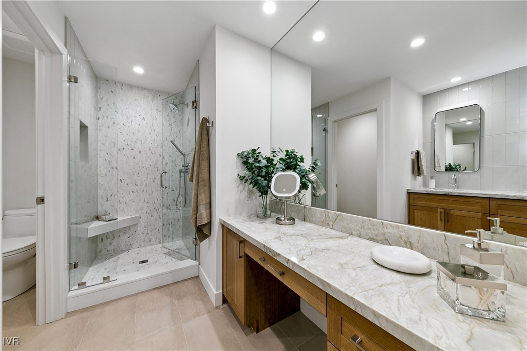 150 Juanita Drive, Unit 2 Incline Village, NV 89451 - Photo 33 of 41 a bathroom with a granite countertop sink mirror and double