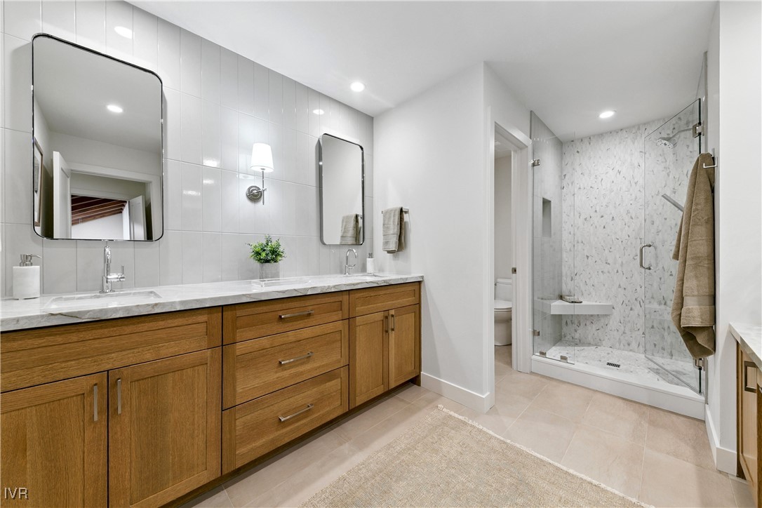 150 Juanita Drive, Unit 2 Incline Village, NV 89451 - Photo 34 of 41 a bathroom with a double vanity sink mirror double and shower