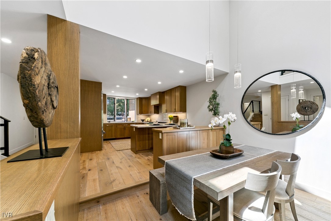 150 Juanita Drive, Unit 2 Incline Village, NV 89451 - Photo 6 of 41 a living room with furniture a mirror and kitchen view