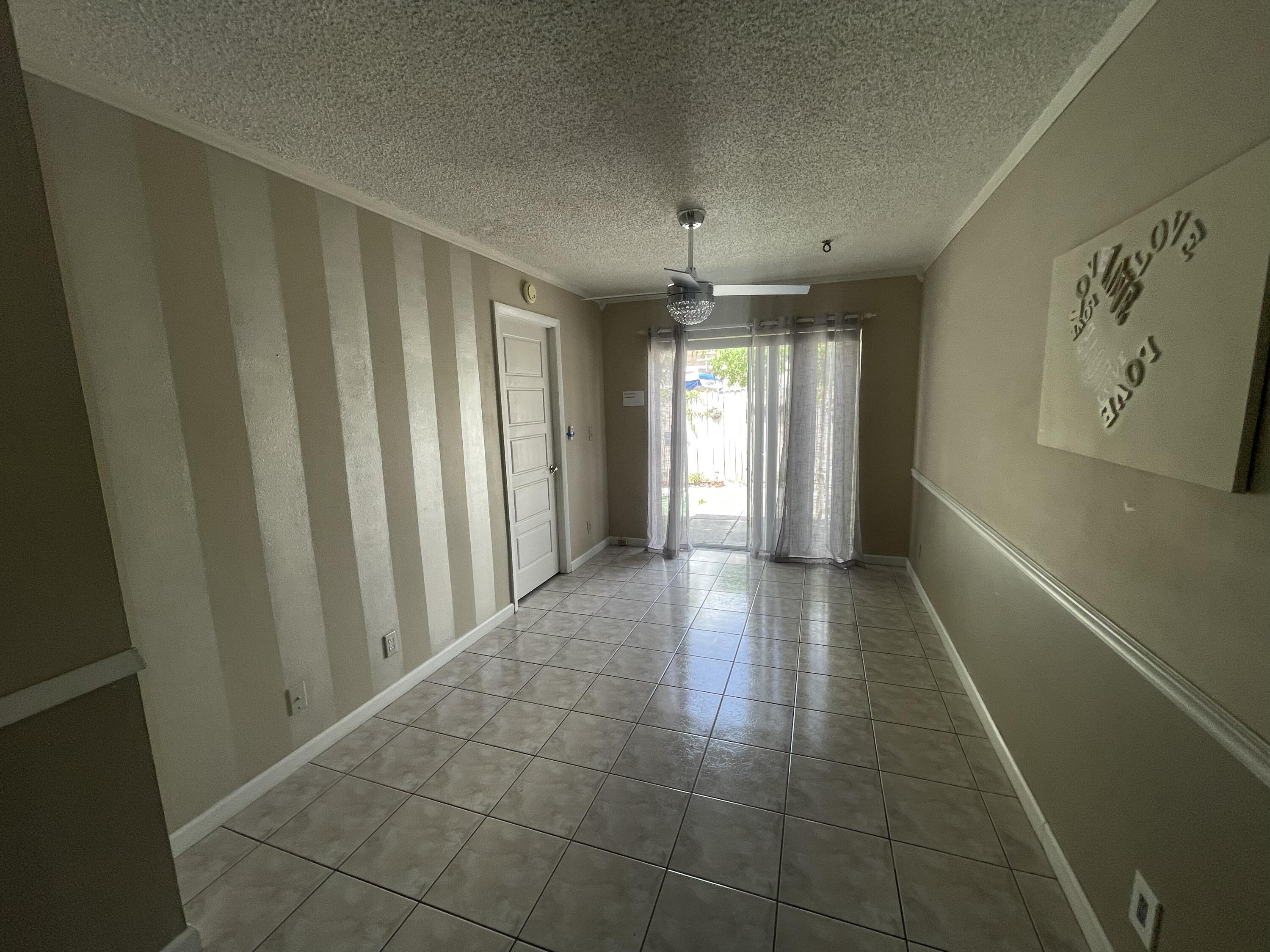 4607 Gladiator Circle Greenacres, FL 33463 - Photo 12 of 23 03D6B32B-99AF-4C01-BF19-F8B7D8D76EDC
