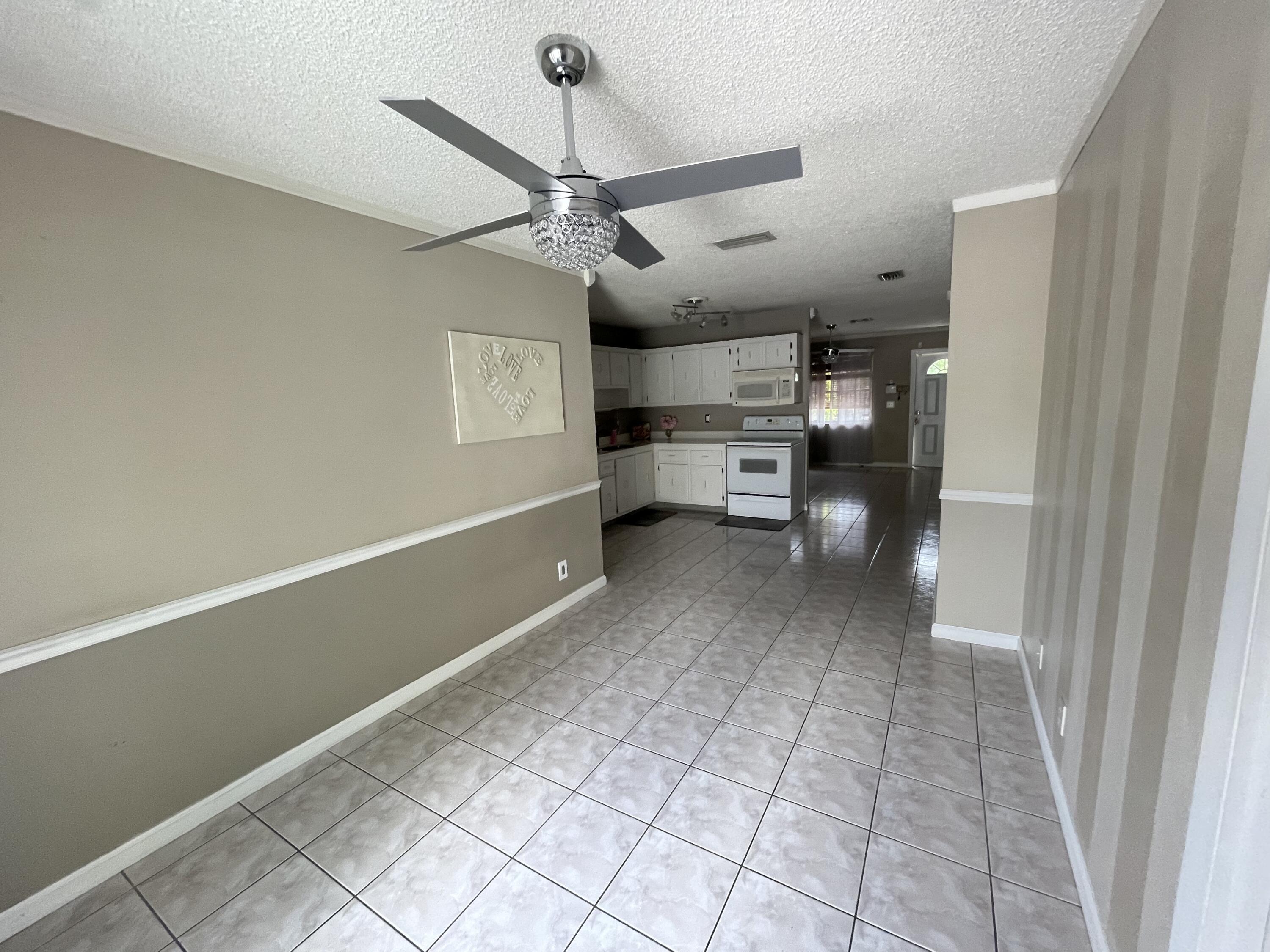 4607 Gladiator Circle Greenacres, FL 33463 - Photo 13 of 23 EB7350F7-EBEF-4C07-8B0D-74EA2660E835