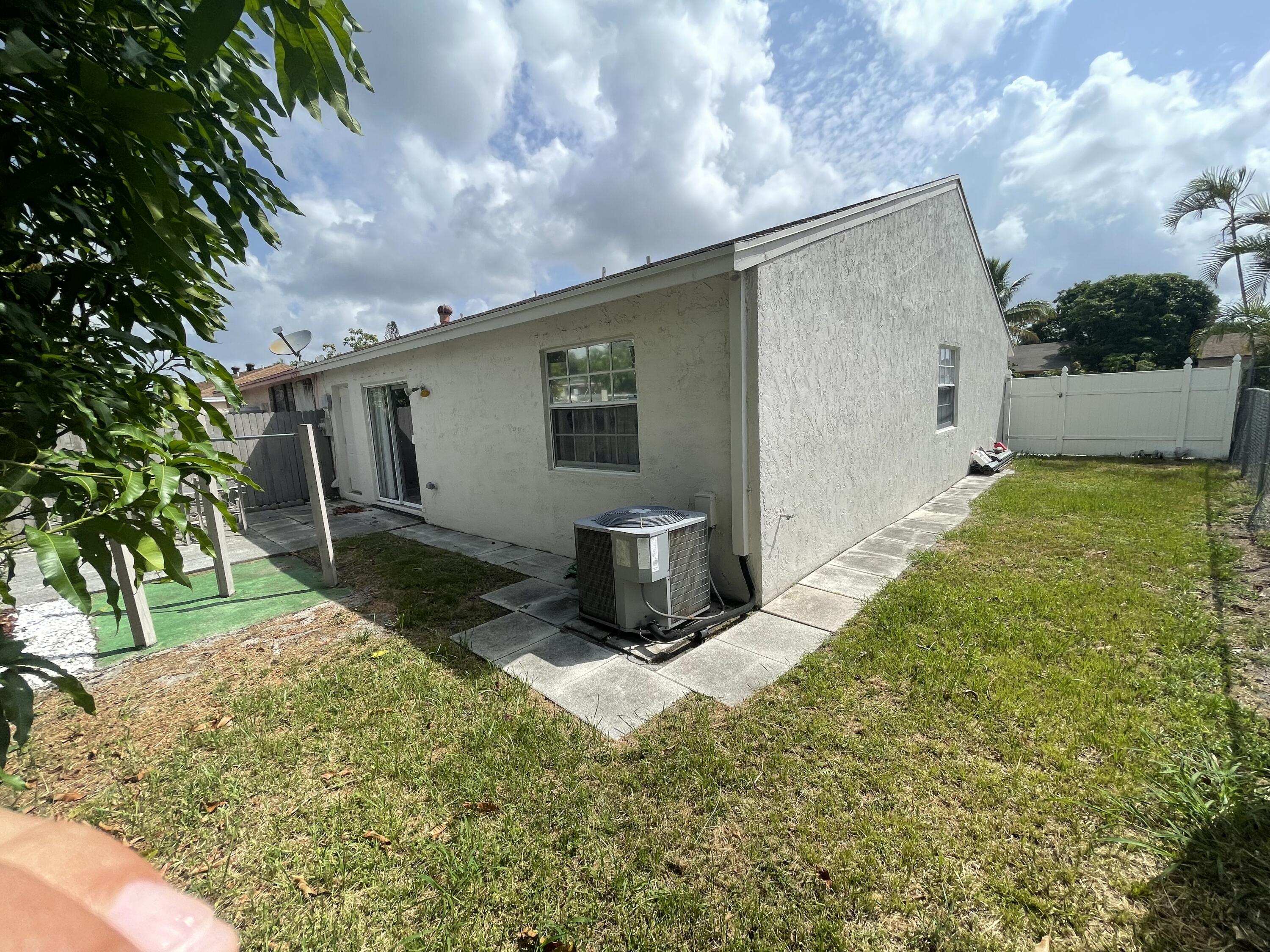 4607 Gladiator Circle Greenacres, FL 33463 - Photo 22 of 23 B2B135D3-4BBB-495A-AEB9-E1E6F6999C5C