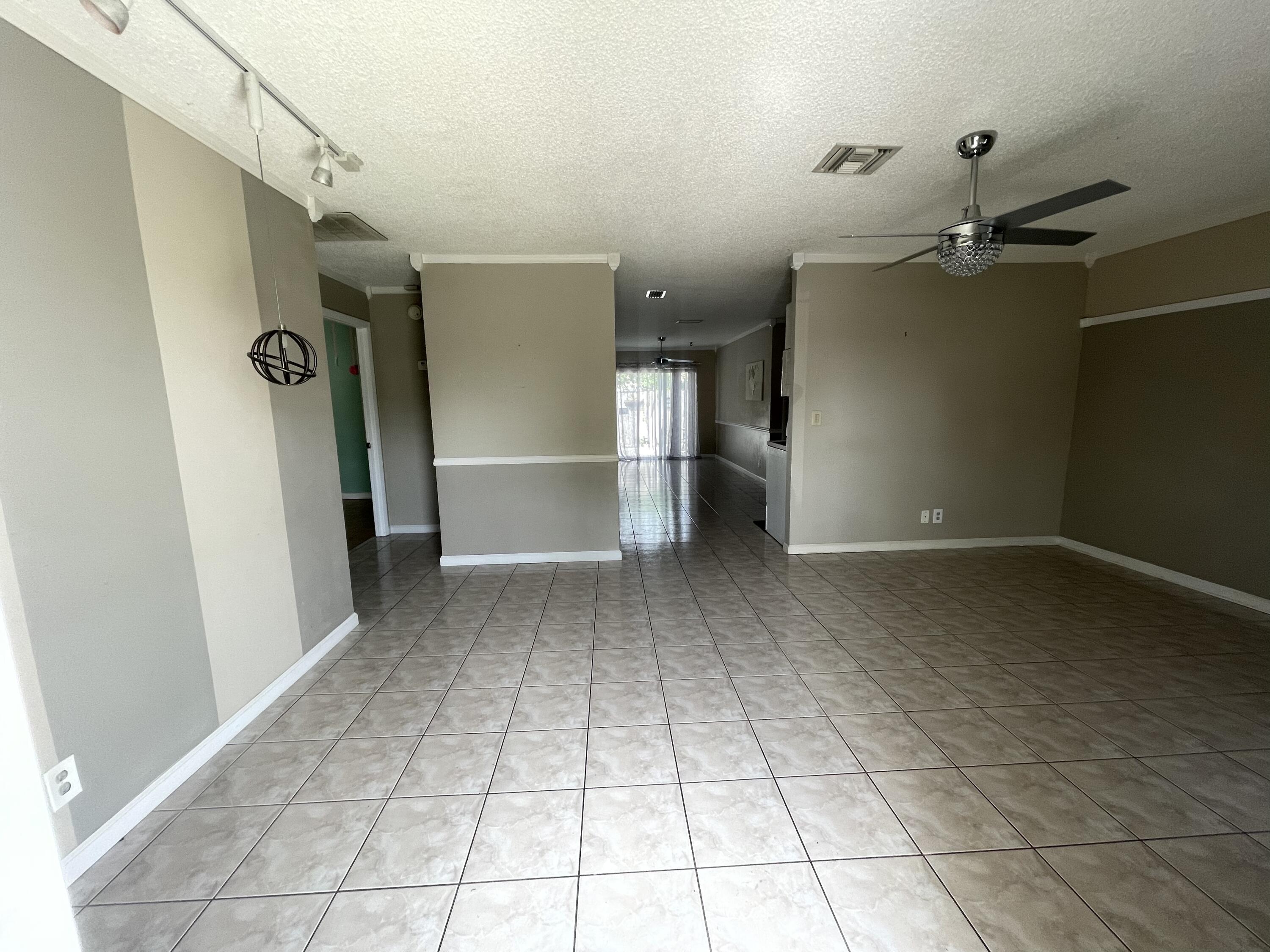 4607 Gladiator Circle Greenacres, FL 33463 - Photo 3 of 23 67A73D7D-6353-453A-BB3E-678760E6D7A2
