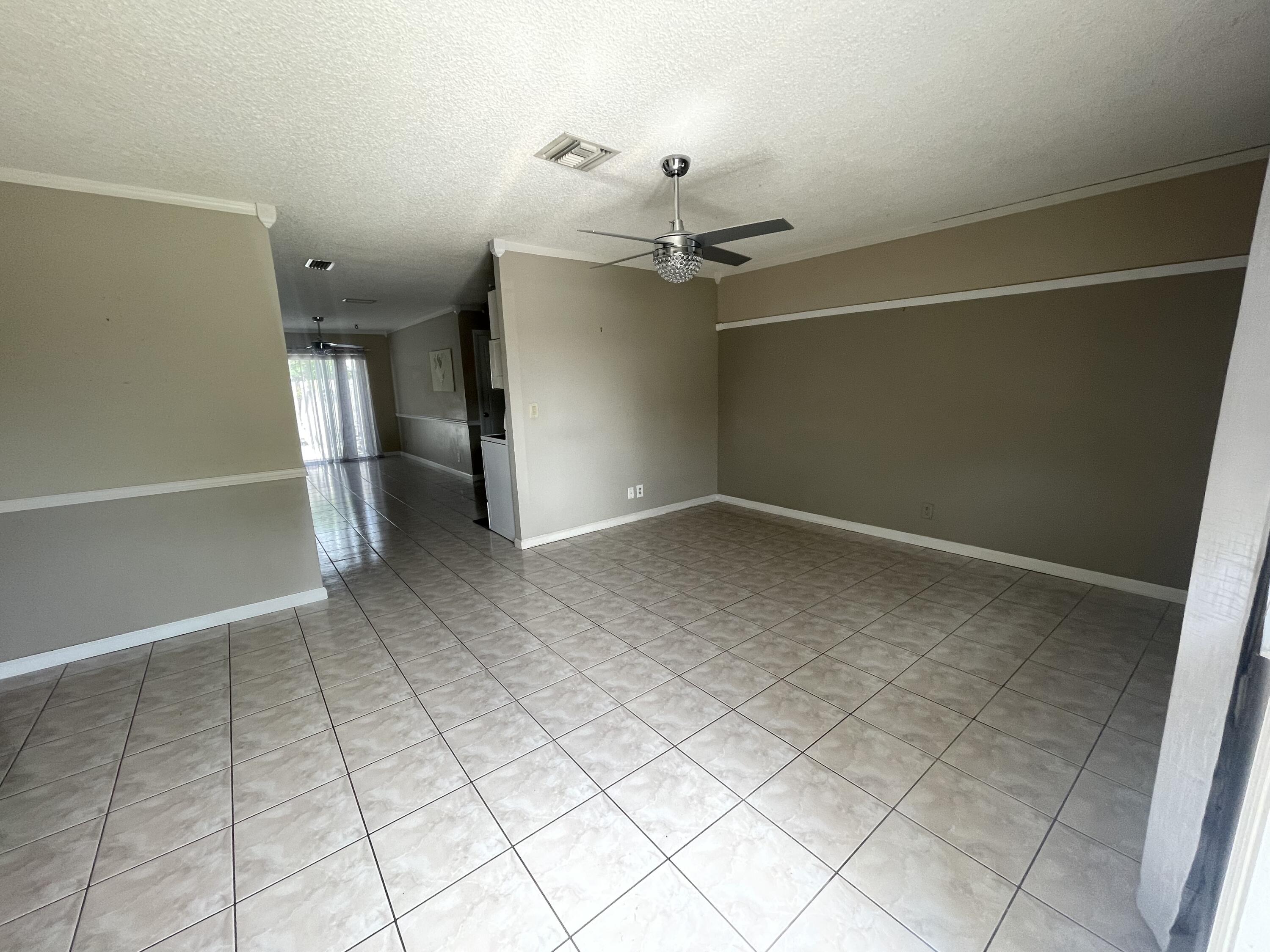 4607 Gladiator Circle Greenacres, FL 33463 - Photo 4 of 23 BA5C27EA-FC3F-4A2F-8431-94797FA4F0E2