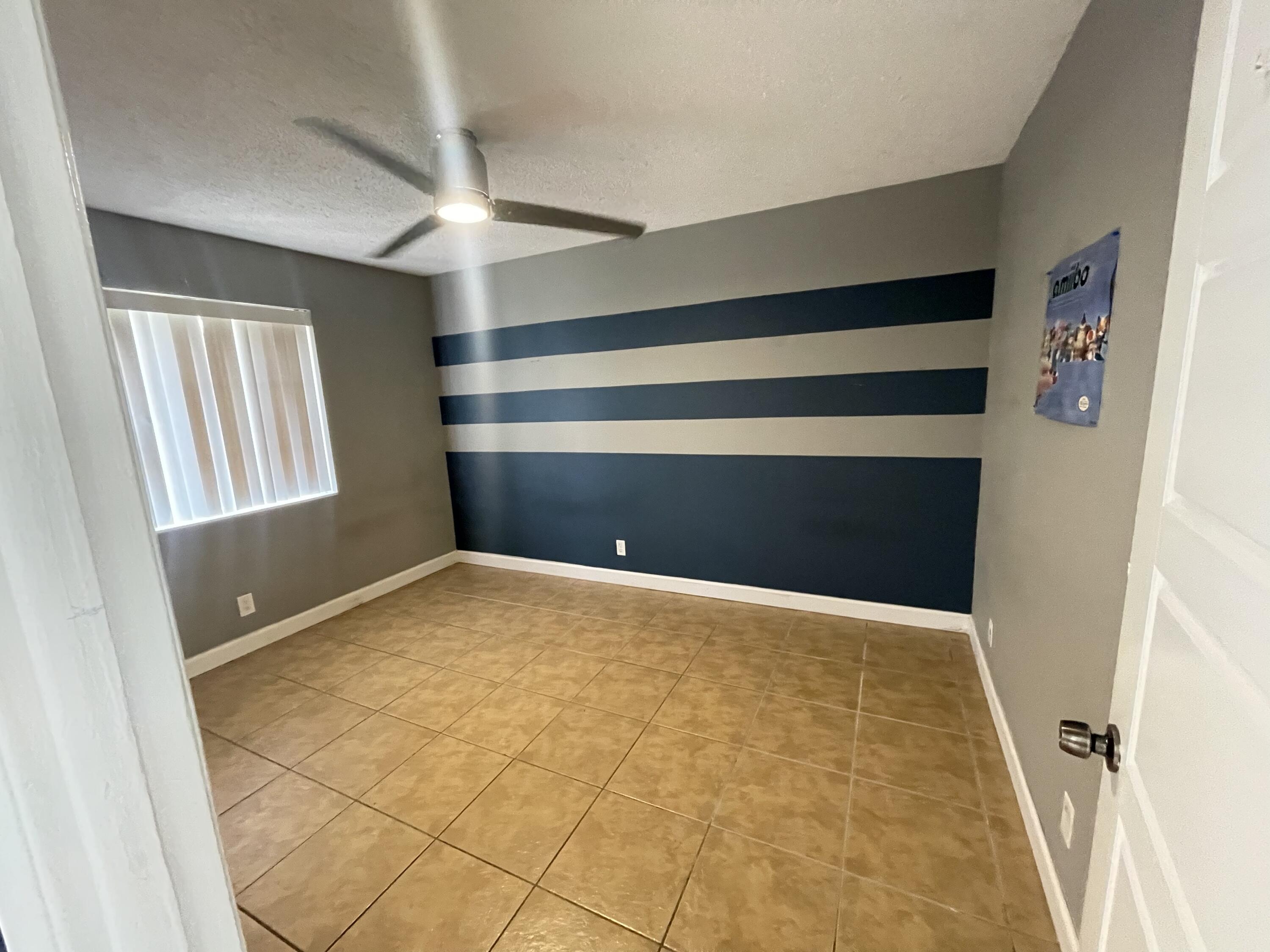 4607 Gladiator Circle Greenacres, FL 33463 - Photo 5 of 23 77A1E142-460F-4E17-AE60-E4320DFA5F2A