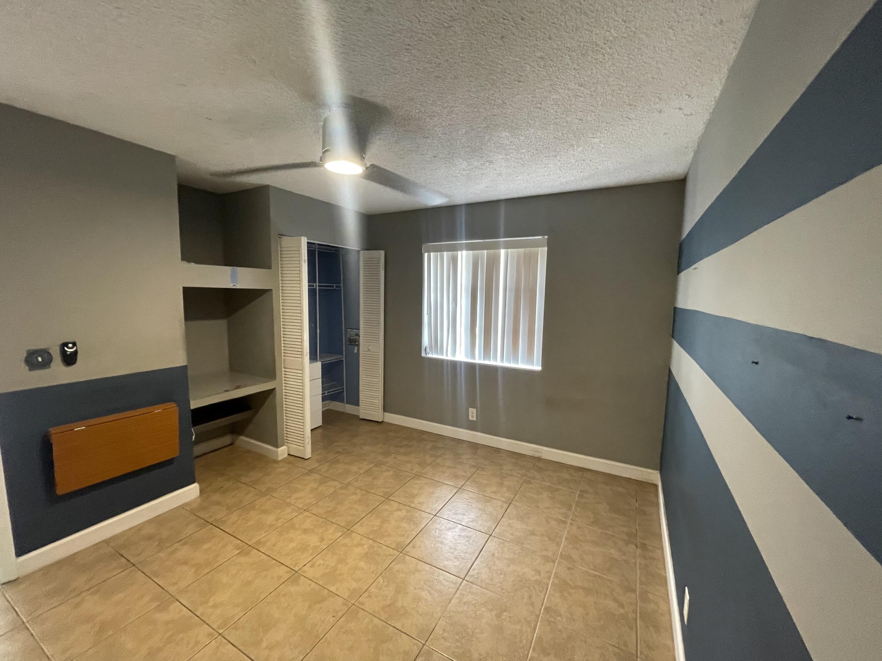 4607 Gladiator Circle Greenacres, FL 33463 - Photo 6 of 23 D8C75CA0-97DE-4AA2-A5D9-682B01B59757
