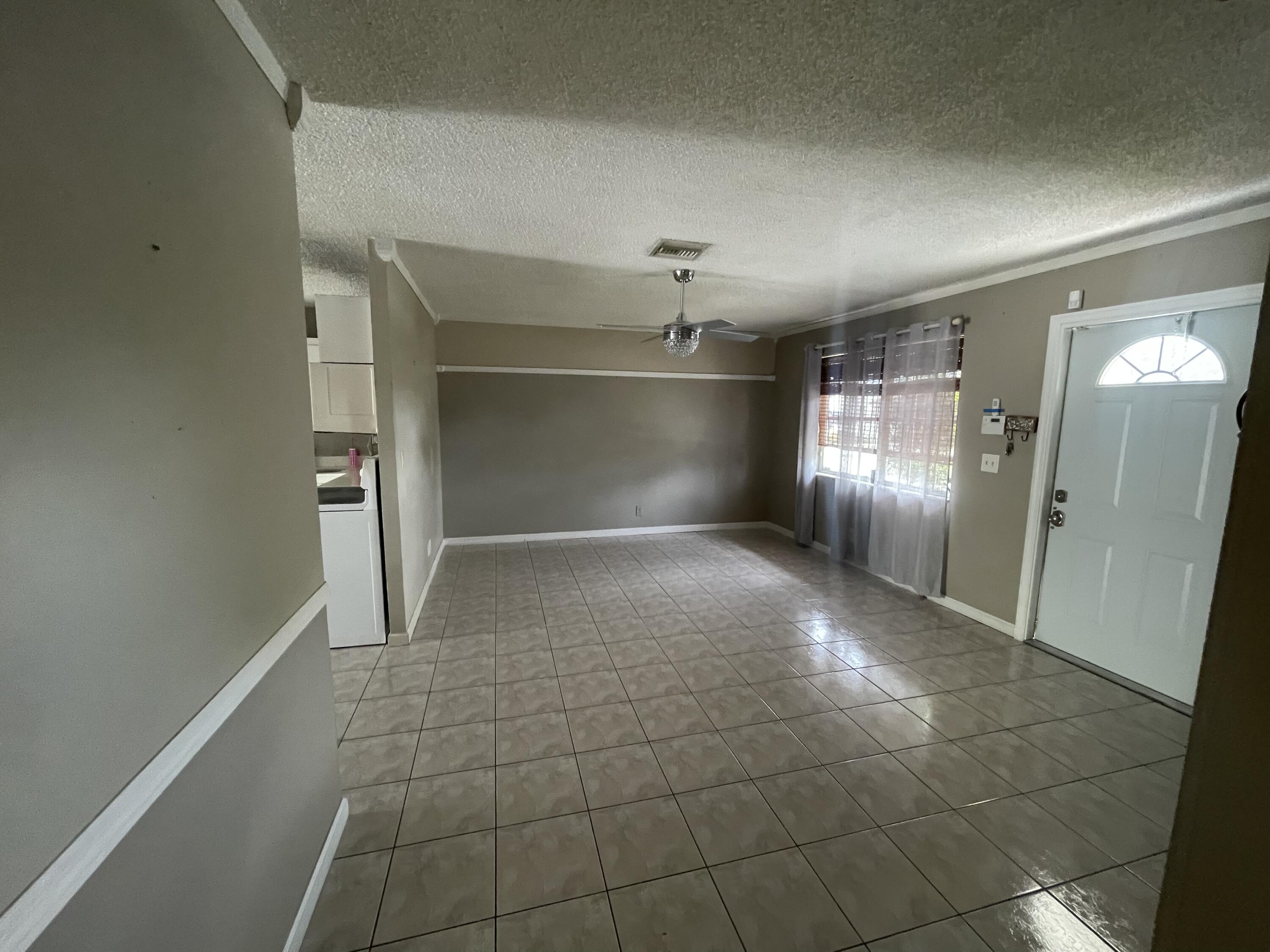 4607 Gladiator Circle Greenacres, FL 33463 - Photo 10 of 23 3171C57C-BDA7-40F7-8A35-CBB91462F99E