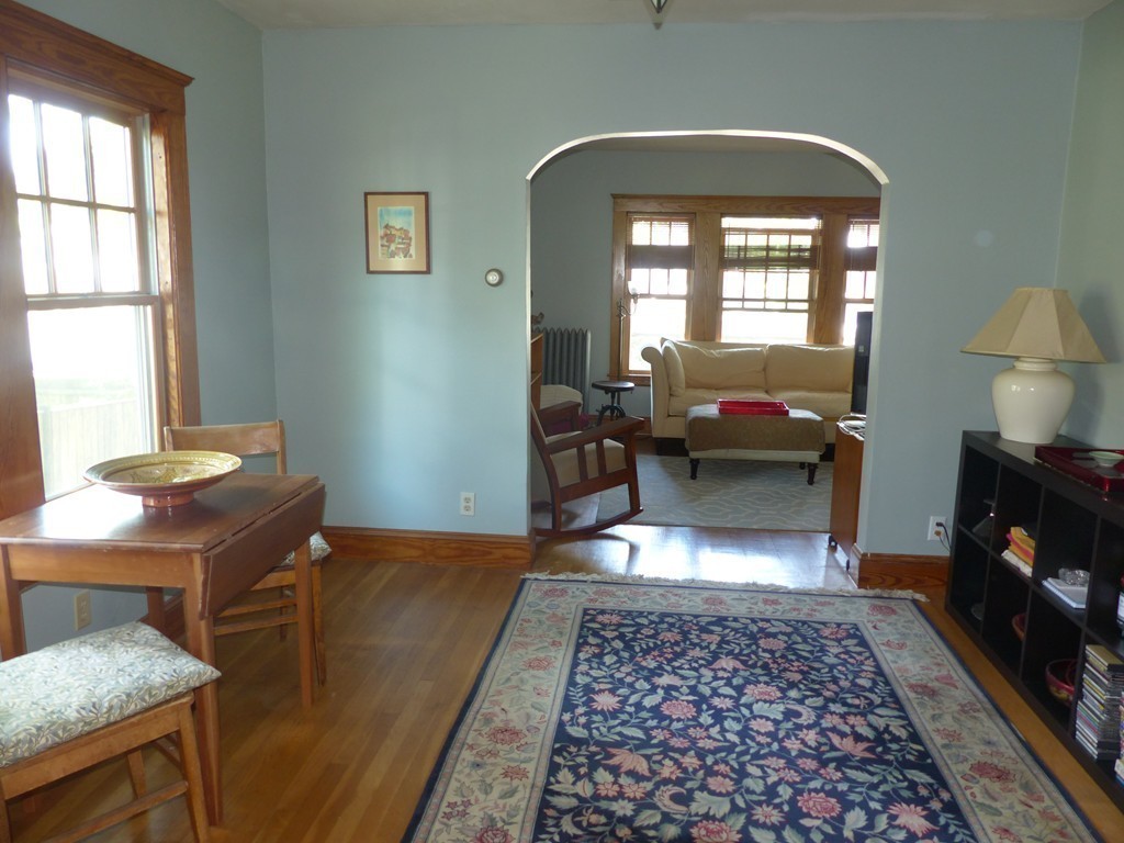 7 Carl Road Arlington, MA 02474 - Photo 8 of 23 a living room with furniture and a window