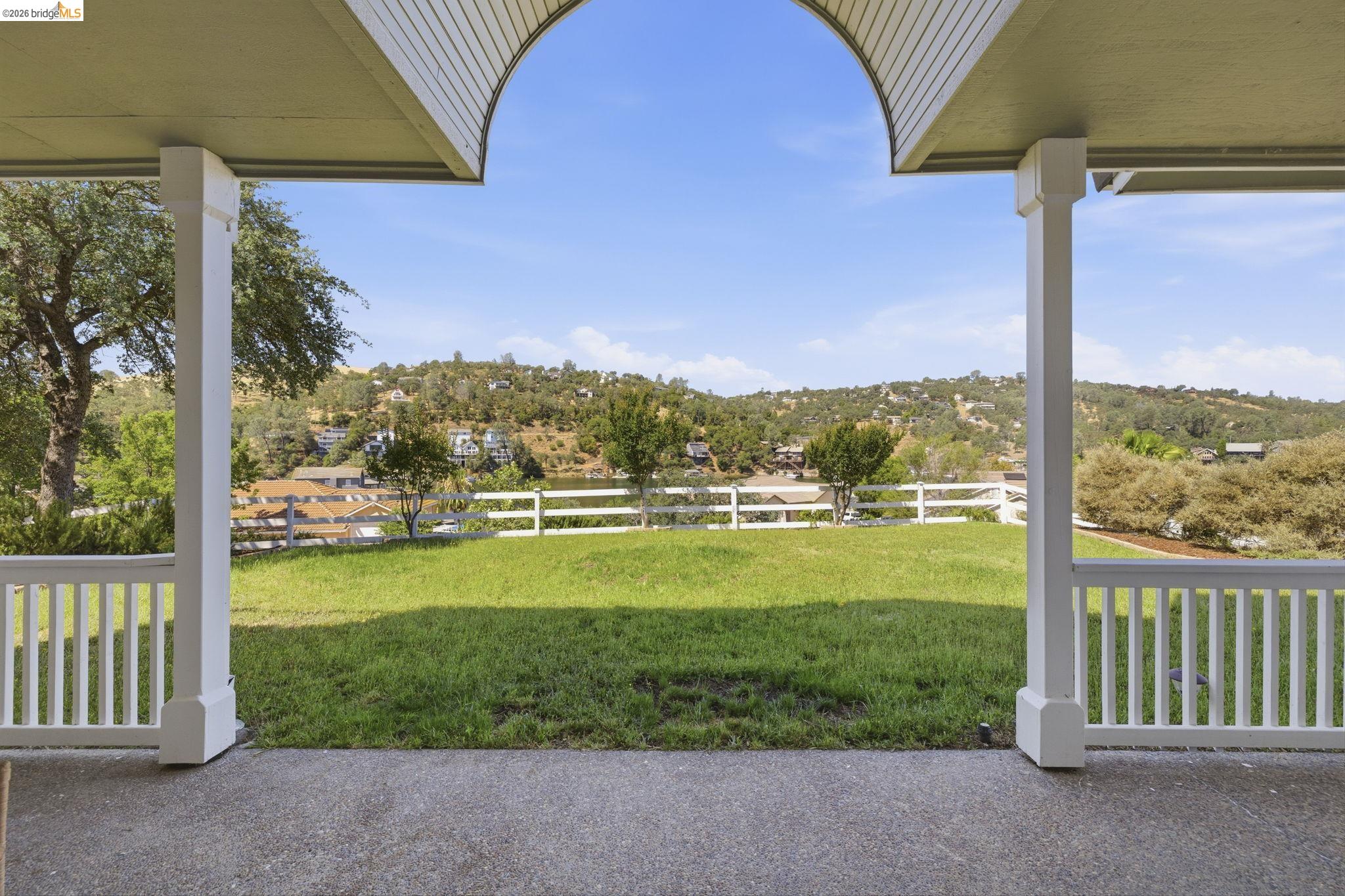 6242 Bluff View Road Copperopolis, CA 95228 - Photo 46 of 59 Covered patio overlooking the grass and lake and hills