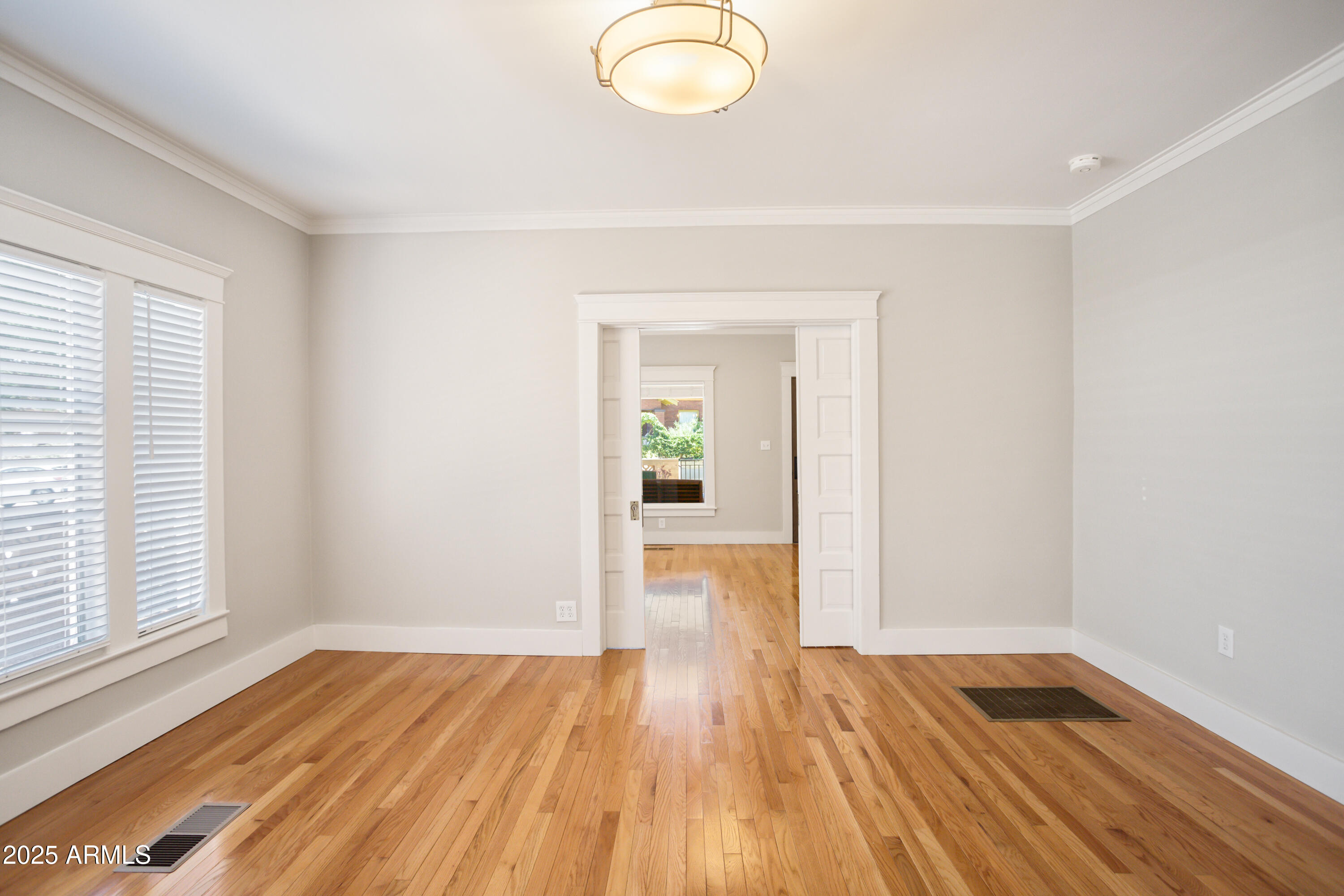 400 Powell Street Bisbee, AZ 85603 - Photo 14 of 57 a view of a room with wooden floor and window
