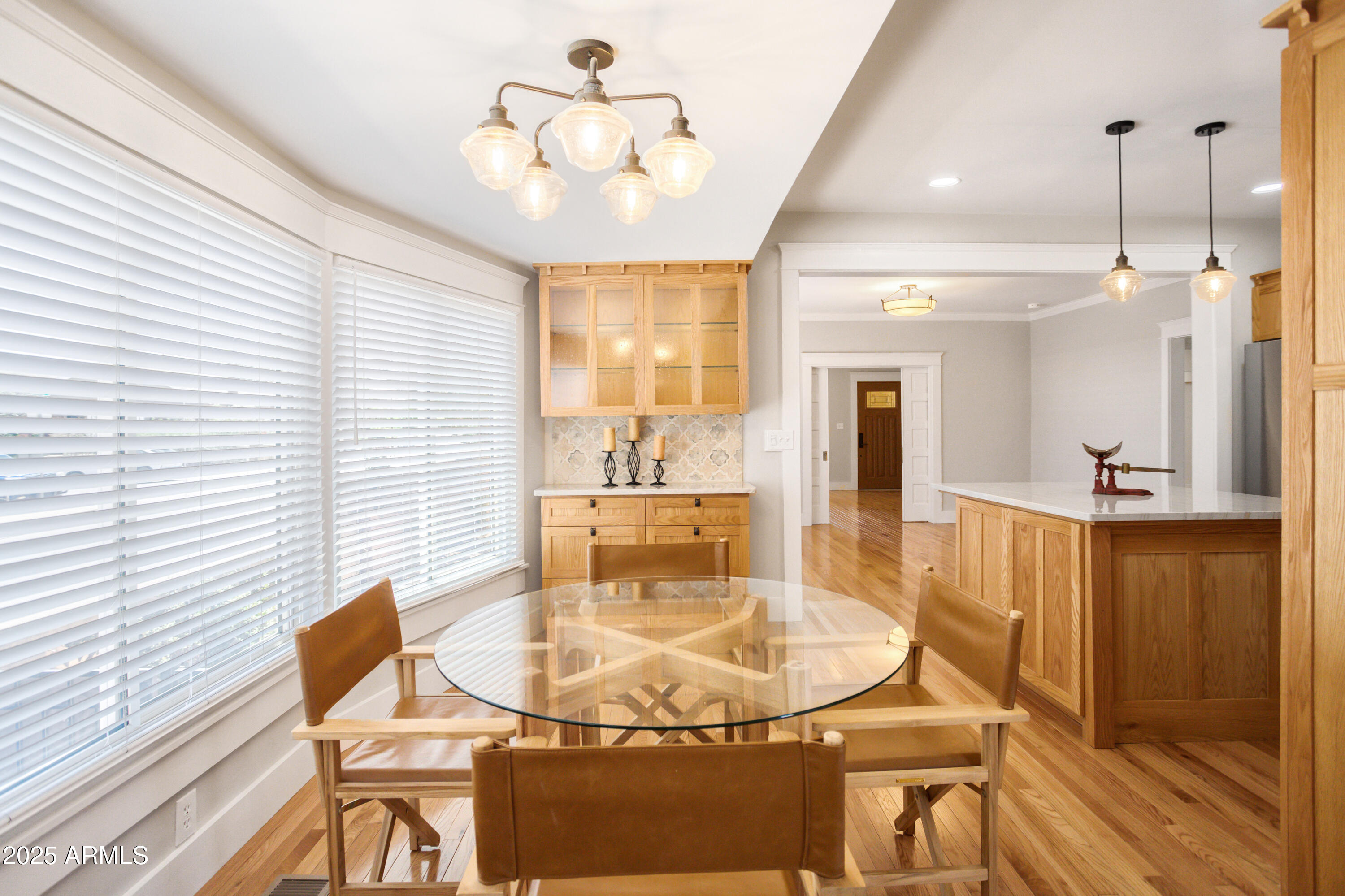 400 Powell Street Bisbee, AZ 85603 - Photo 22 of 57 a view of a dining room with furniture and wooden floor