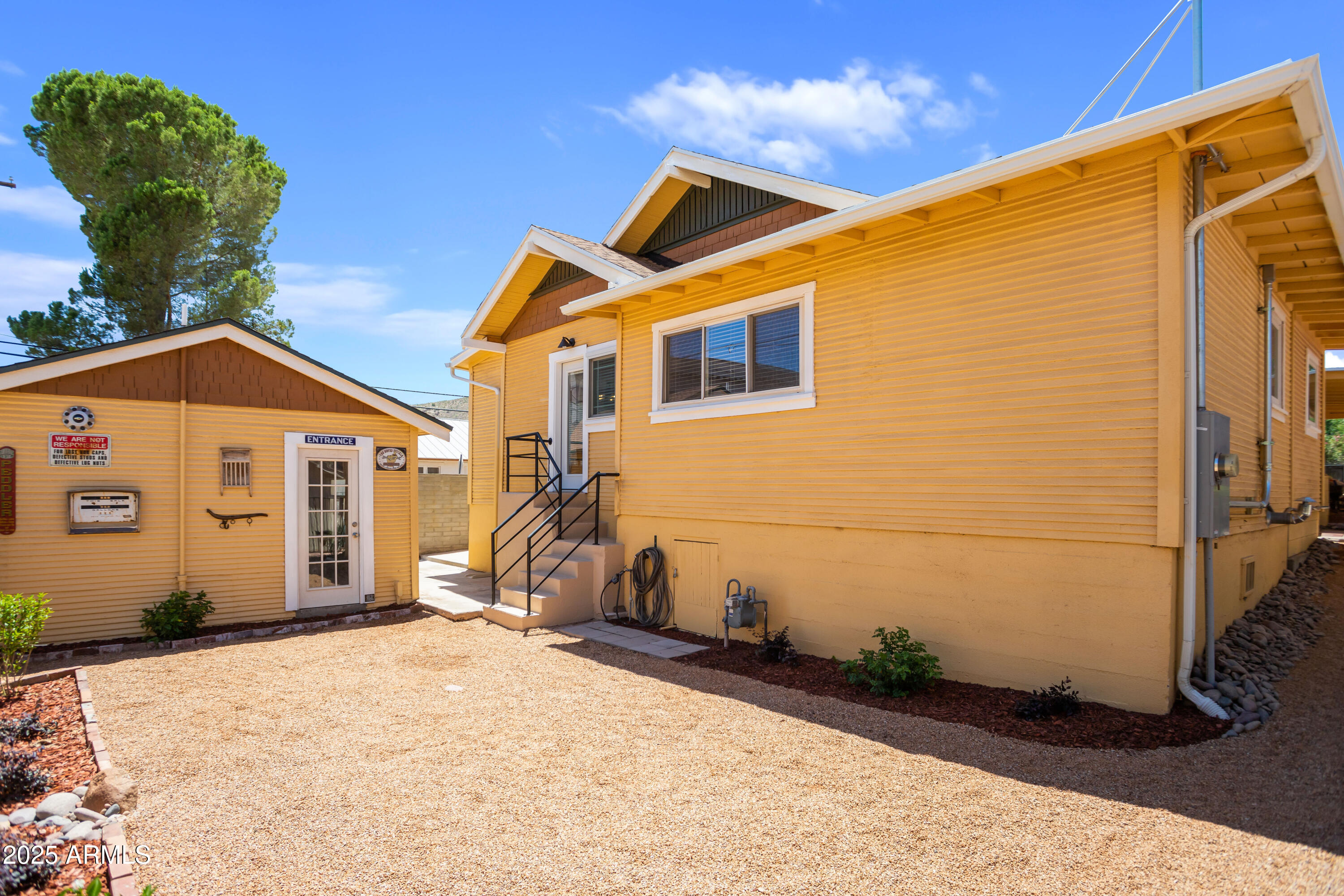 400 Powell Street Bisbee, AZ 85603 - Photo 27 of 57 a view of a house with a backyard