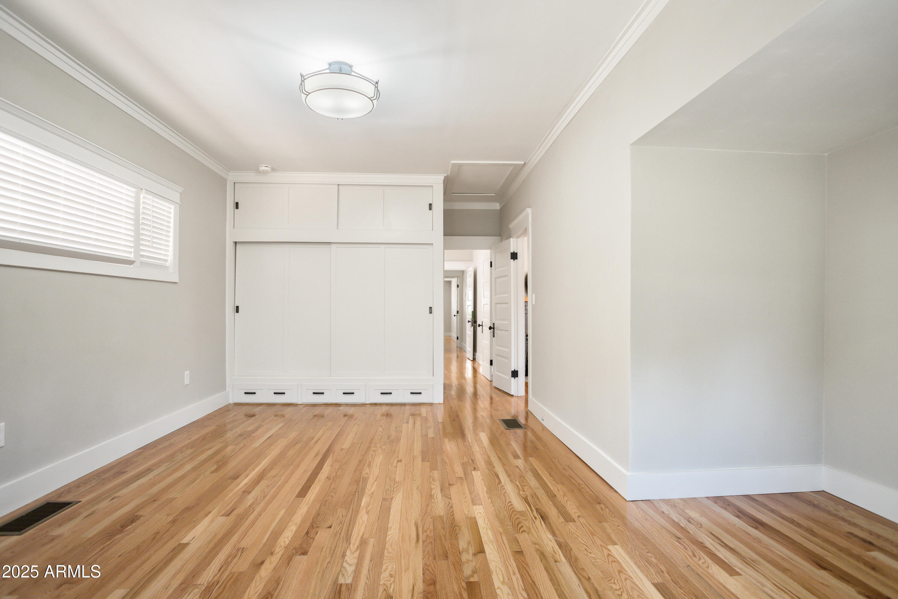 400 Powell Street Bisbee, AZ 85603 - Photo 29 of 57 a view of a room with wooden floor and a window