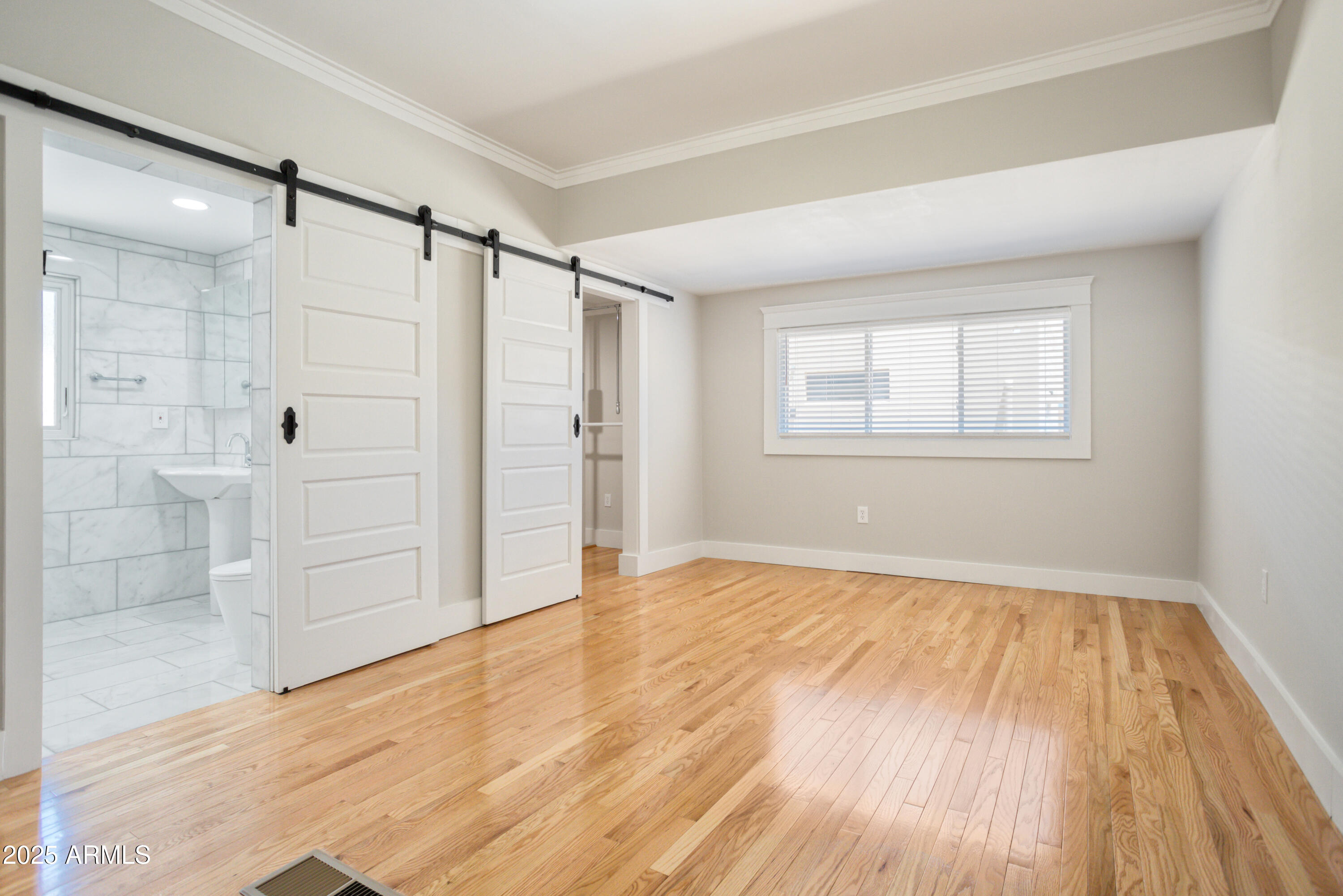 400 Powell Street Bisbee, AZ 85603 - Photo 36 of 57 wooden floor in an empty room with a window