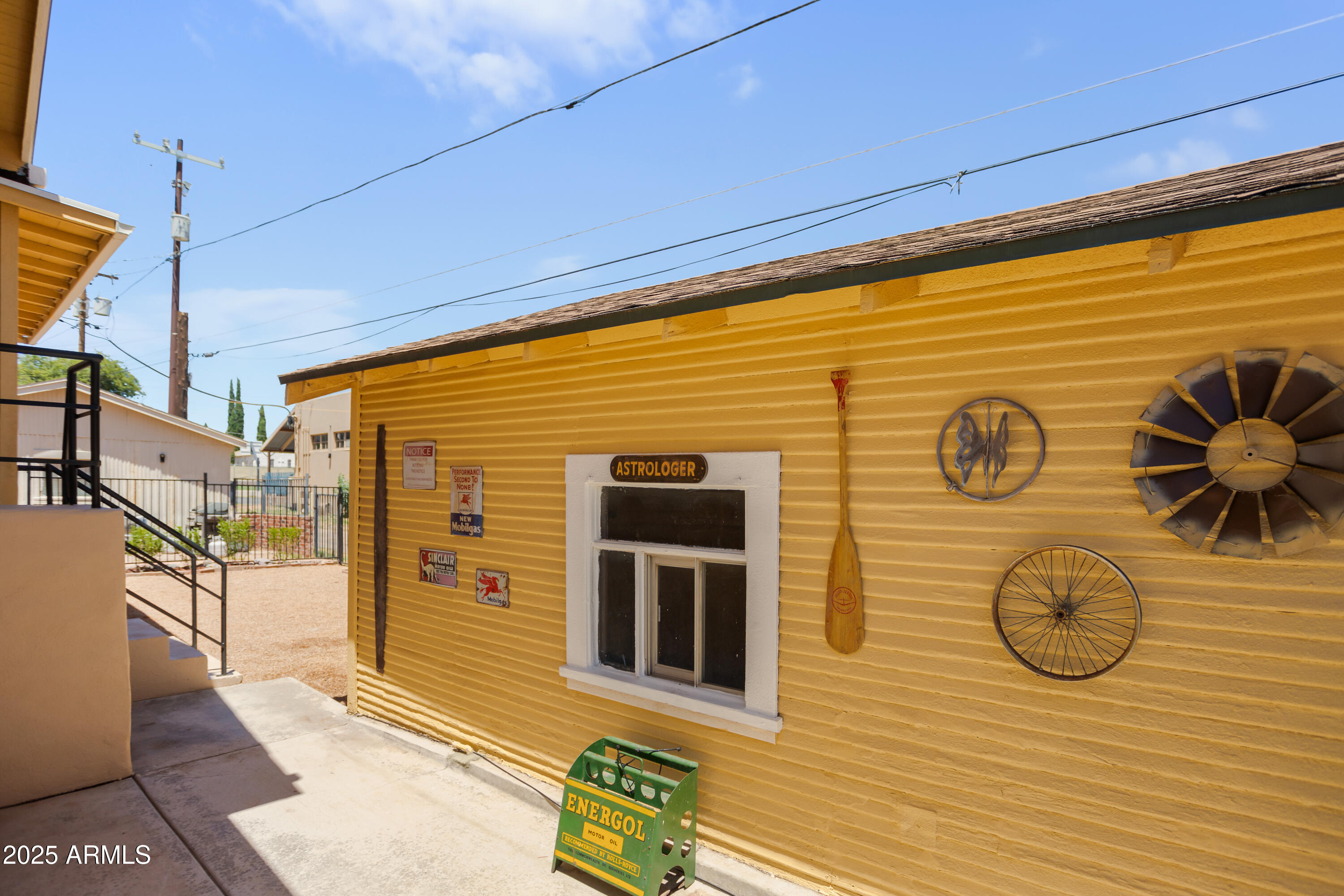 400 Powell Street Bisbee, AZ 85603 - Photo 50 of 57 a view of a door with a table and chairs
