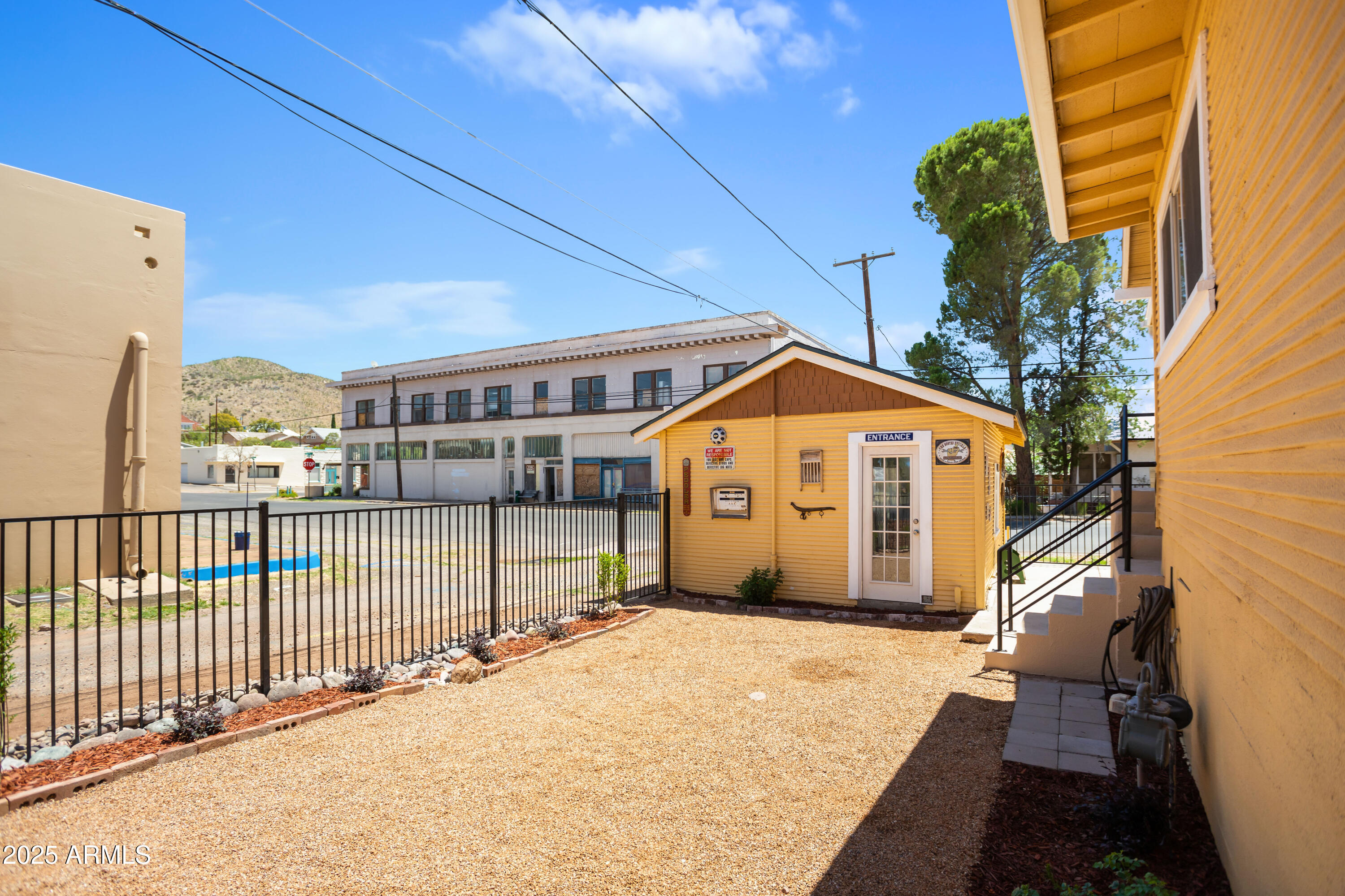 400 Powell Street Bisbee, AZ 85603 - Photo 51 of 57 a view of a house with a balcony