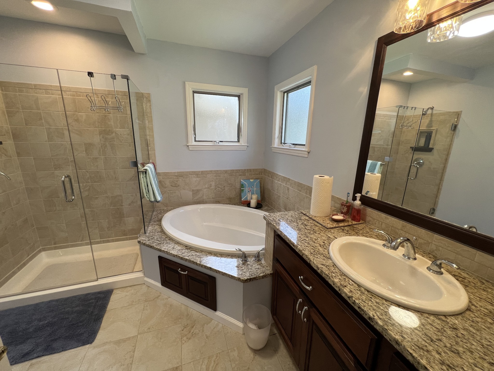 325 Hardy Road Pulaski, TN 38478 - Photo 7 of 42 a bathroom with a granite countertop tub sink and mirror