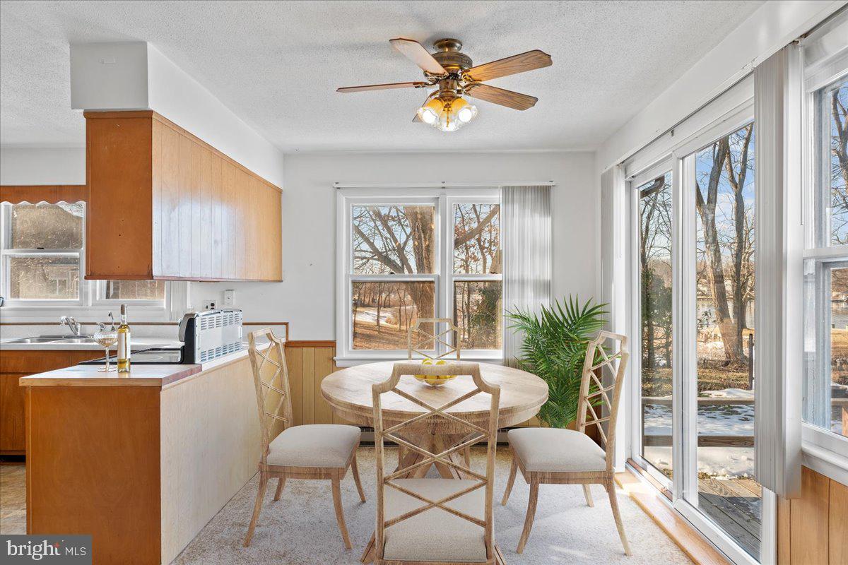 4801 Avery Road Shady Side, MD 20764 - Photo 11 of 25 a dining room with furniture and window