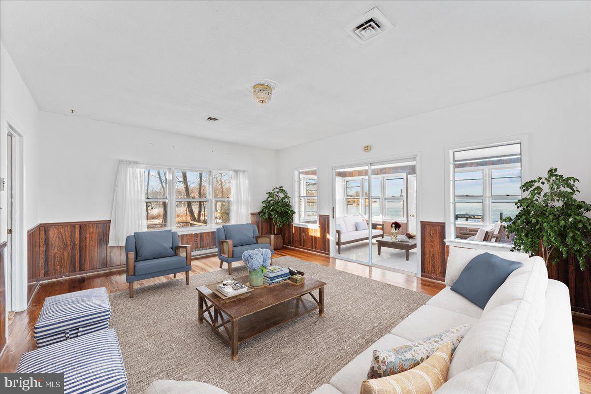 4801 Avery Road Shady Side, MD 20764 - Photo 14 of 25 a living room with furniture and a large window