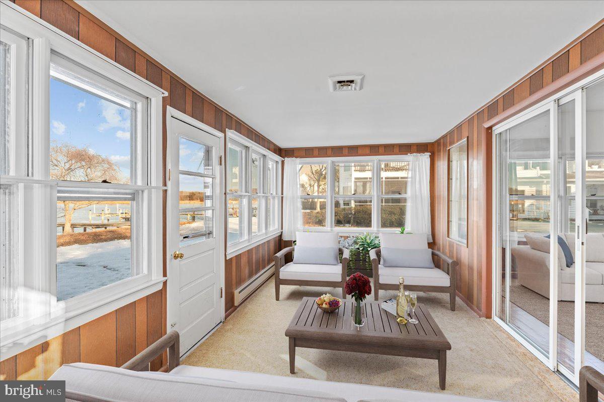 4801 Avery Road Shady Side, MD 20764 - Photo 16 of 25 a living room with furniture and a large window