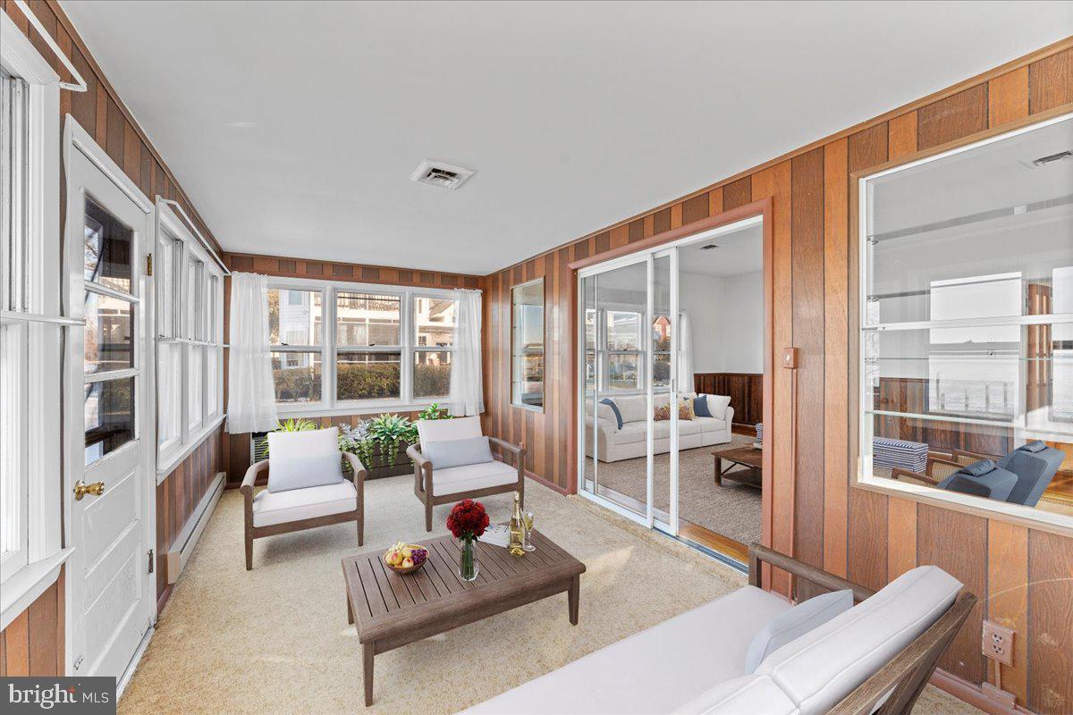 4801 Avery Road Shady Side, MD 20764 - Photo 17 of 25 a living room with furniture and a large window