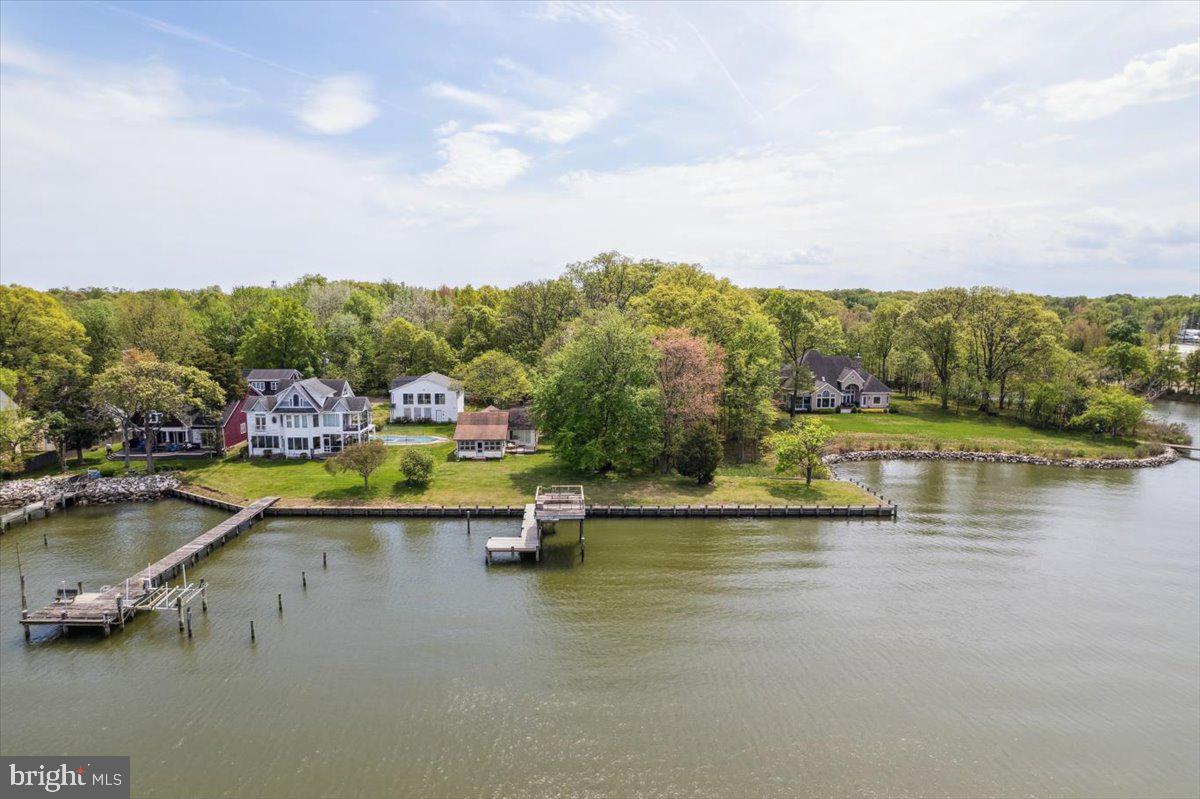 4801 Avery Road Shady Side, MD 20764 - Photo 3 of 25 a view of a lake with a mountain