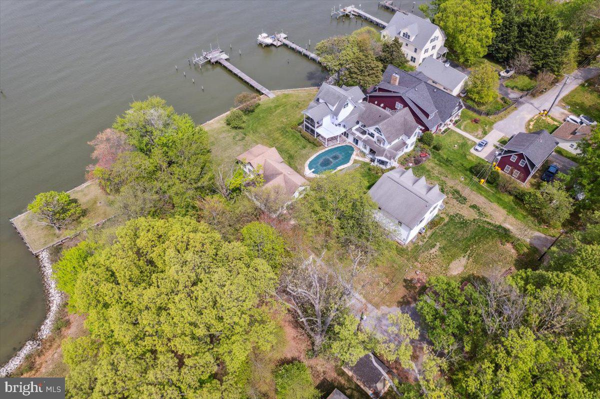 4801 Avery Road Shady Side, MD 20764 - Photo 5 of 25 an aerial view of a house with swimming pool and outdoor space