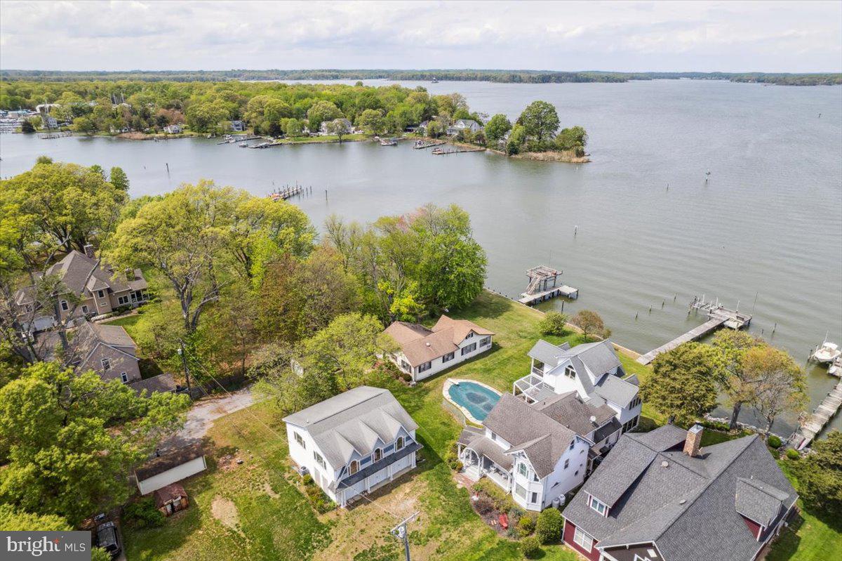 4801 Avery Road Shady Side, MD 20764 - Photo 6 of 25 an aerial view of a house with a lake view
