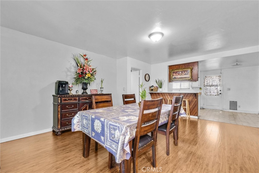 6254 Stanton Avenue Highland, CA 92346 - Photo 8 of 29 a bedroom with furniture and wooden floor