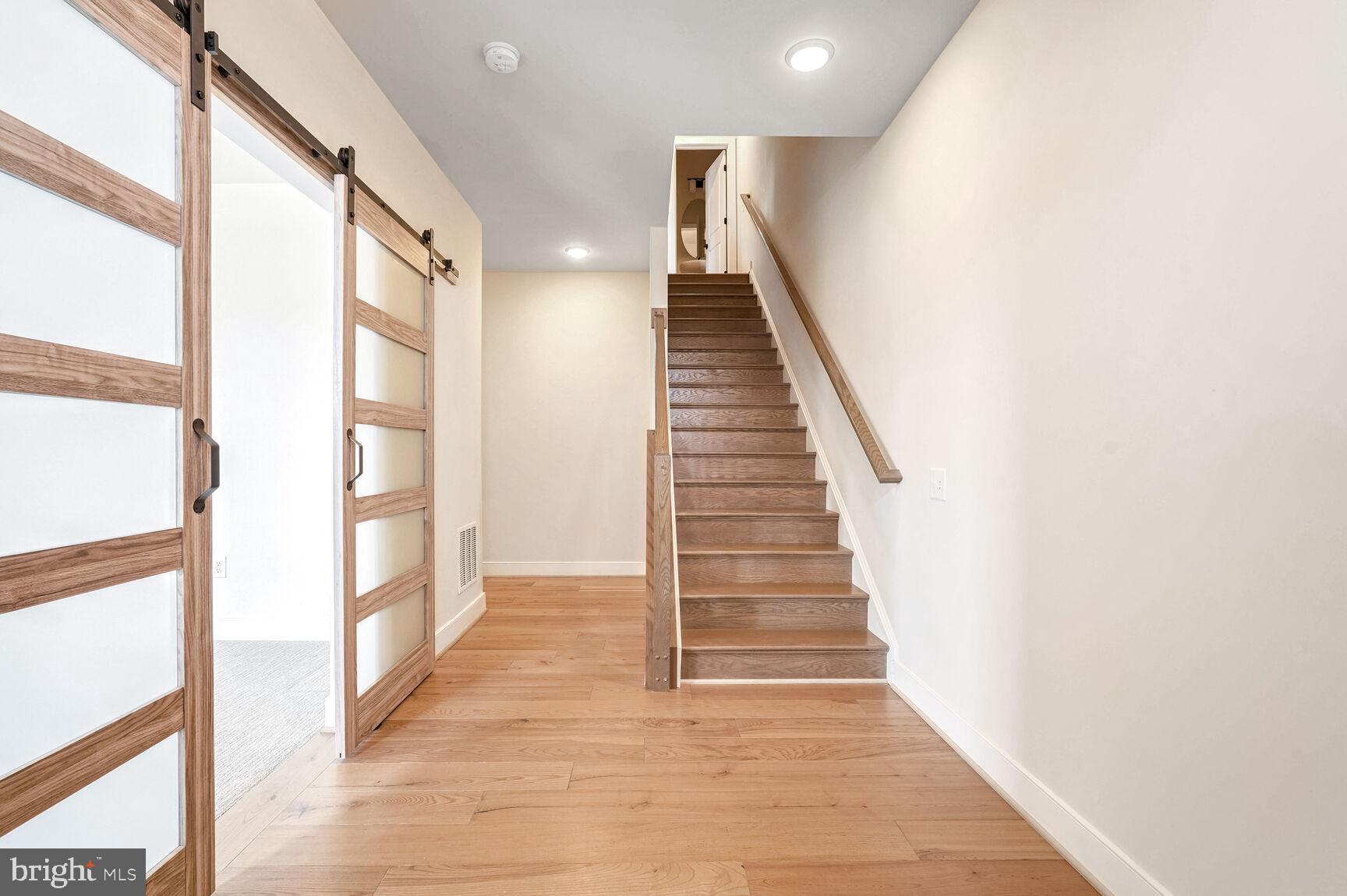 1769 Riverbluff Avenue Dumfries, VA 22026 - Photo 11 of 31 a view of a hallway with wooden floor and entryway